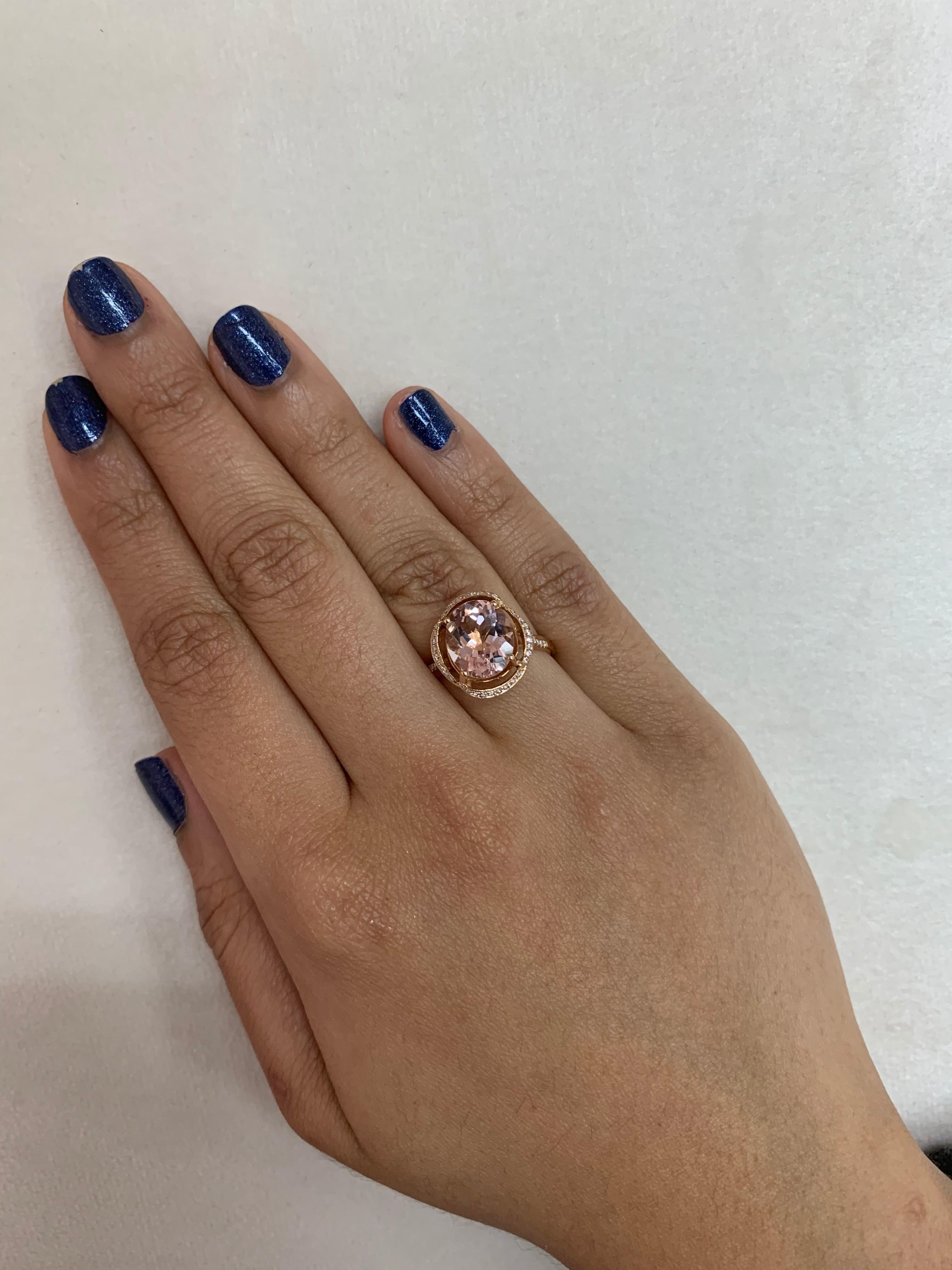 This collection features an array of magnificent morganites! Accented with diamonds these rings are made in rose gold and present a classic yet elegant look. 

Classic morganite ring in 18K rose gold with diamonds. 

Morganite: 2.94 carat oval