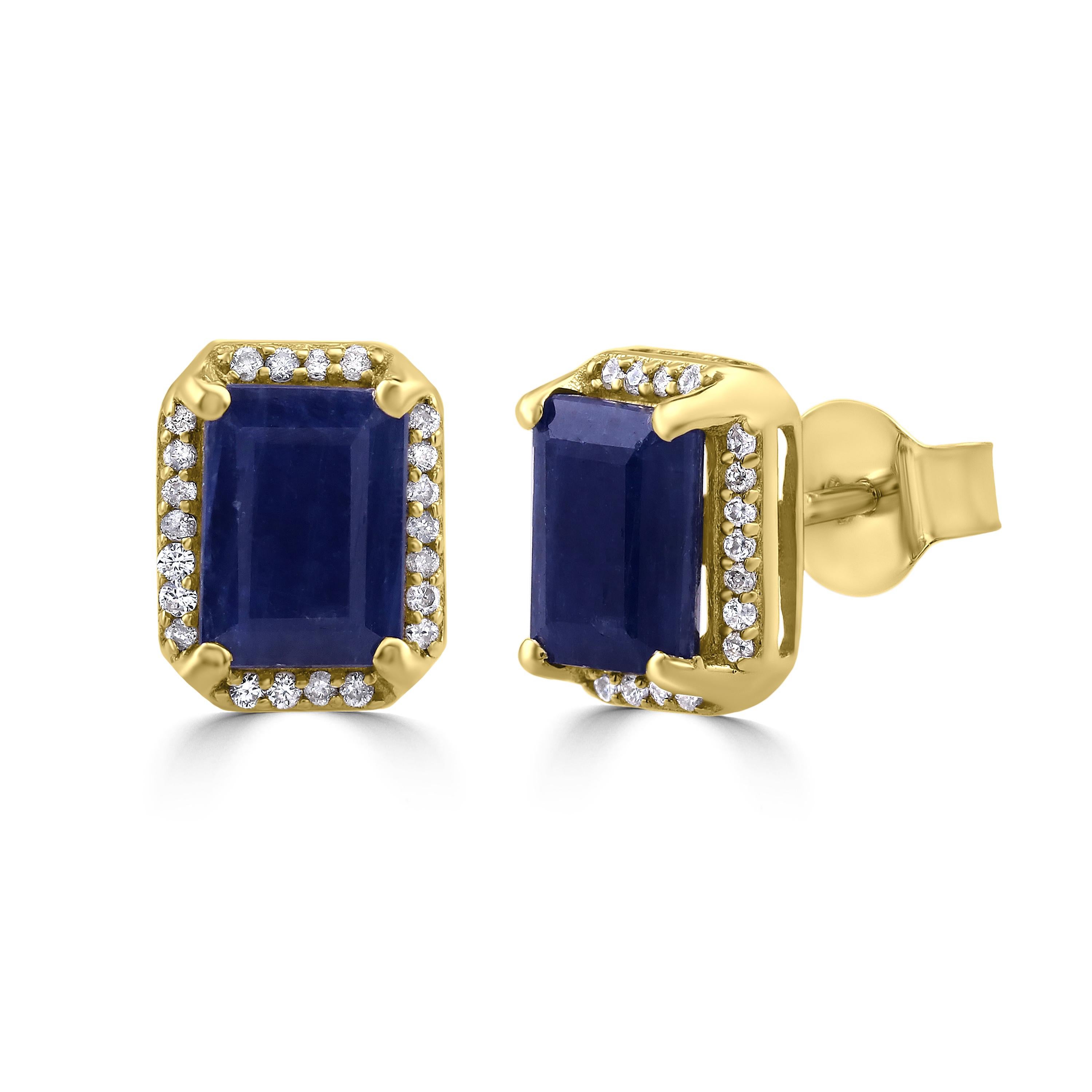 Some of the world's most desirable gemstones come together ! These Gemistry stud earrings boast of 2.9 carat emerald cut blue sapphires at the center in four prongs accentuated by a halo of round and brilliant cut diamonds prong set in 14k yellow