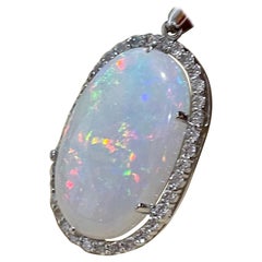 29 Carat Oval Ethiopian Opal and 2.5 Carat Diamond Pendant or Necklace 14K Gold