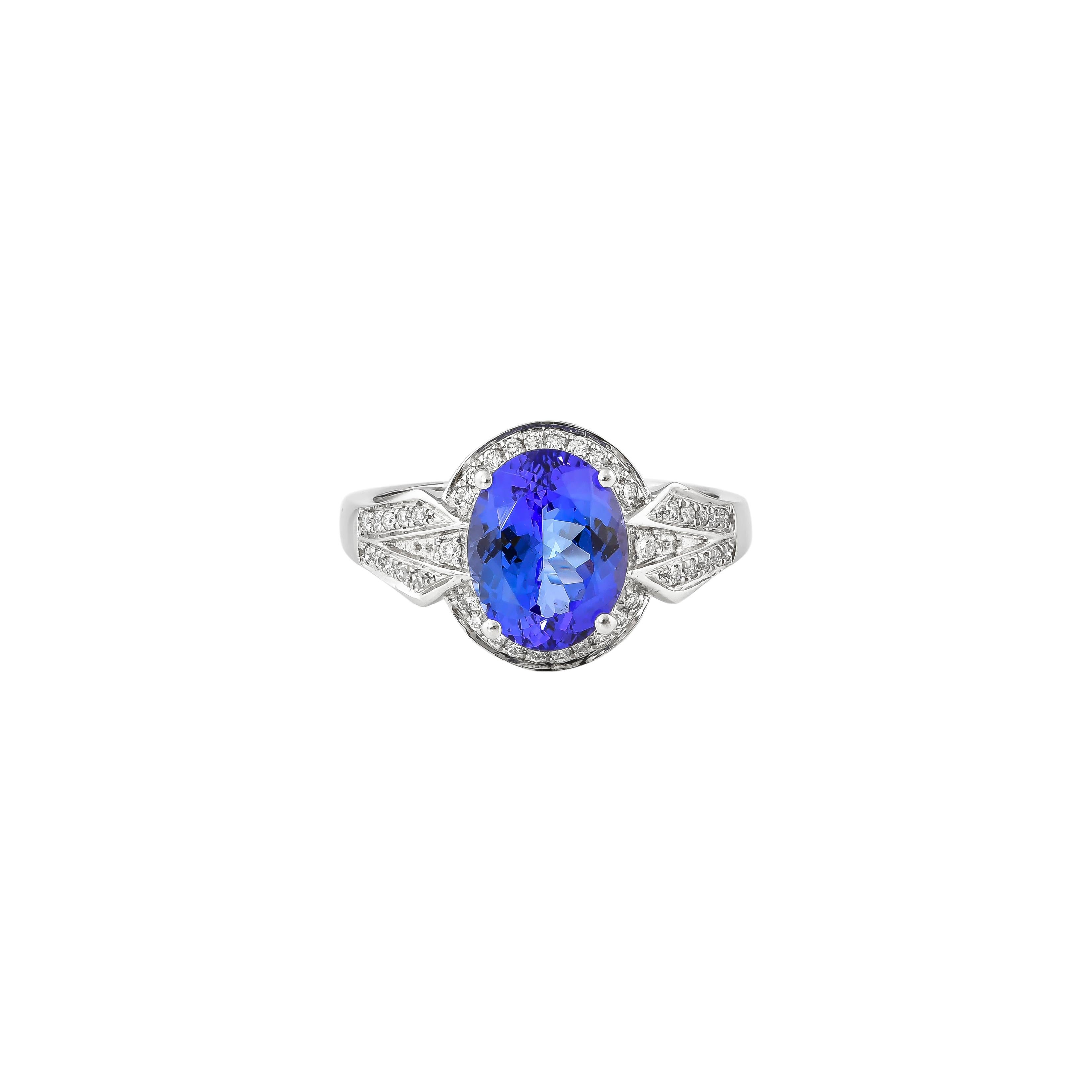 Oval Cut 2.9 Carat Tanzanite and White Diamond Ring in 18 Karat White Gold For Sale