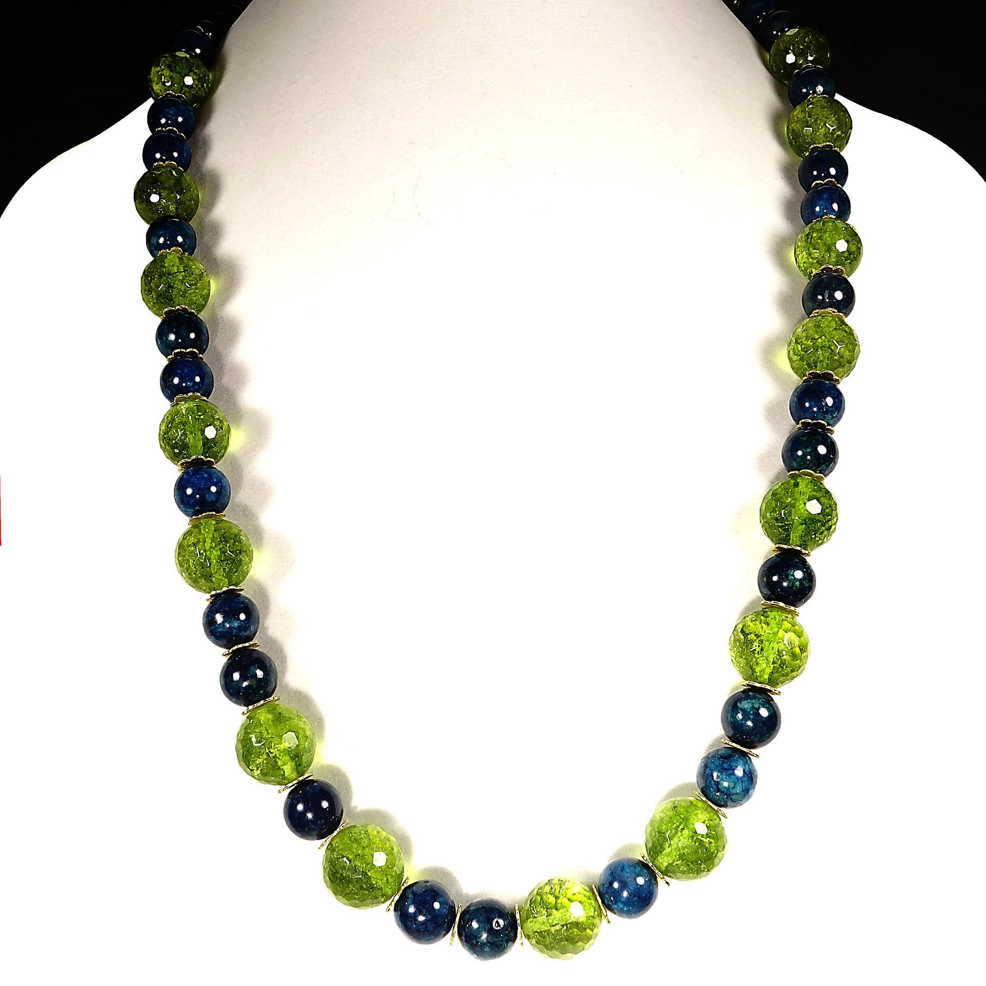 29 Inch long handmade necklace of faceted Peridot beads and highly polished Apatite 12MM spheres. These sparkling limey Peridots are happily complemented by the glowing teal Apatite. This 29 inch length is perfect for large cowl collars and blazers.