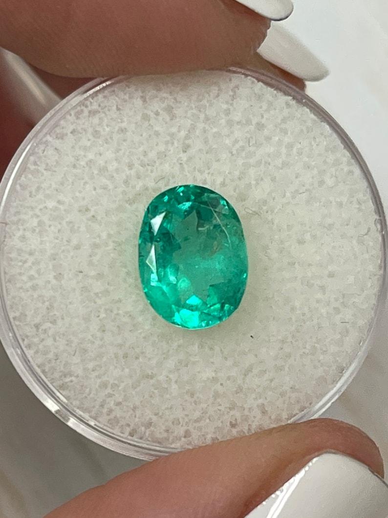 2.90 Carat 10x8mm Bluish Green Colombian Emerald Oval Cut - May Birthstone Gem In New Condition For Sale In Jupiter, FL