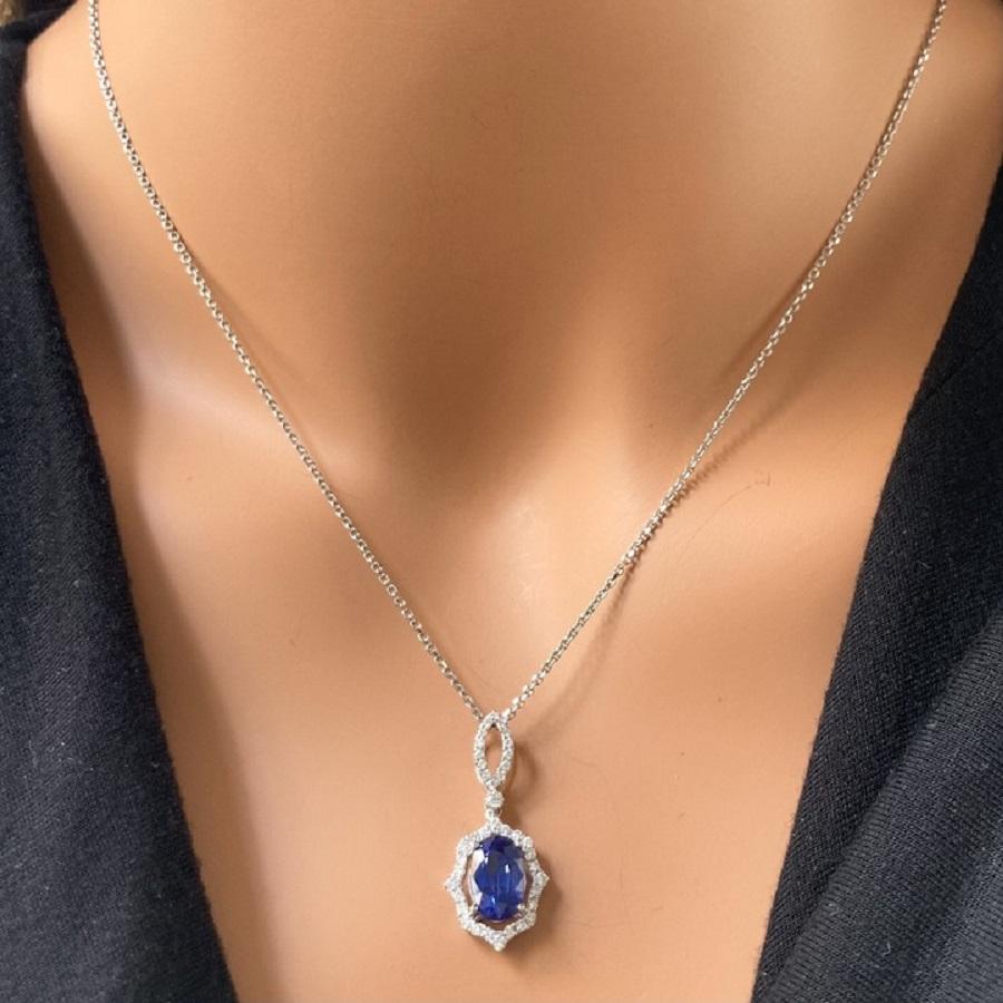 Oval Cut 2.90 Carat Blue Oval Sapphire & Diamond Pendant In 14k White Gold For Sale