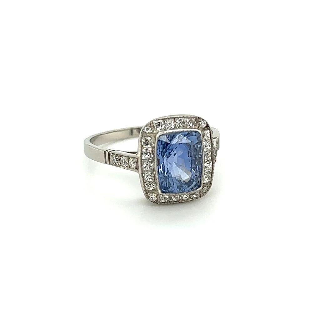 Simply Beautiful! Elegant and finely detailed Cushion-Cut Sapphire and Diamond Platinum Cocktail Ring. Centering a securely nestled with a 2.90 Carat Cushion Sapphire surrounded by 10 Old European cut Diamonds, weighing approx. 0.10tcw and 16 French