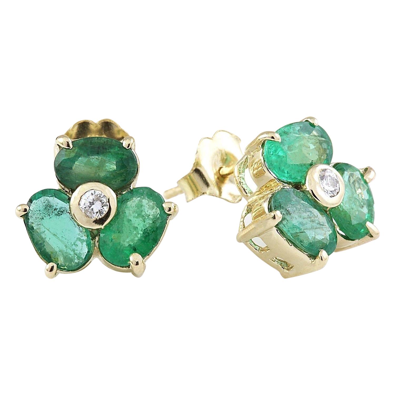 Discover elegance with our exquisite 14K Solid Yellow Gold Diamond Stud Earrings, featuring captivating Natural Emerald gemstones. The mainstones are dazzling 2.80 Carat Emeralds, each measuring 6.00x4.00 mm, exuding a rich green hue. Adorned with