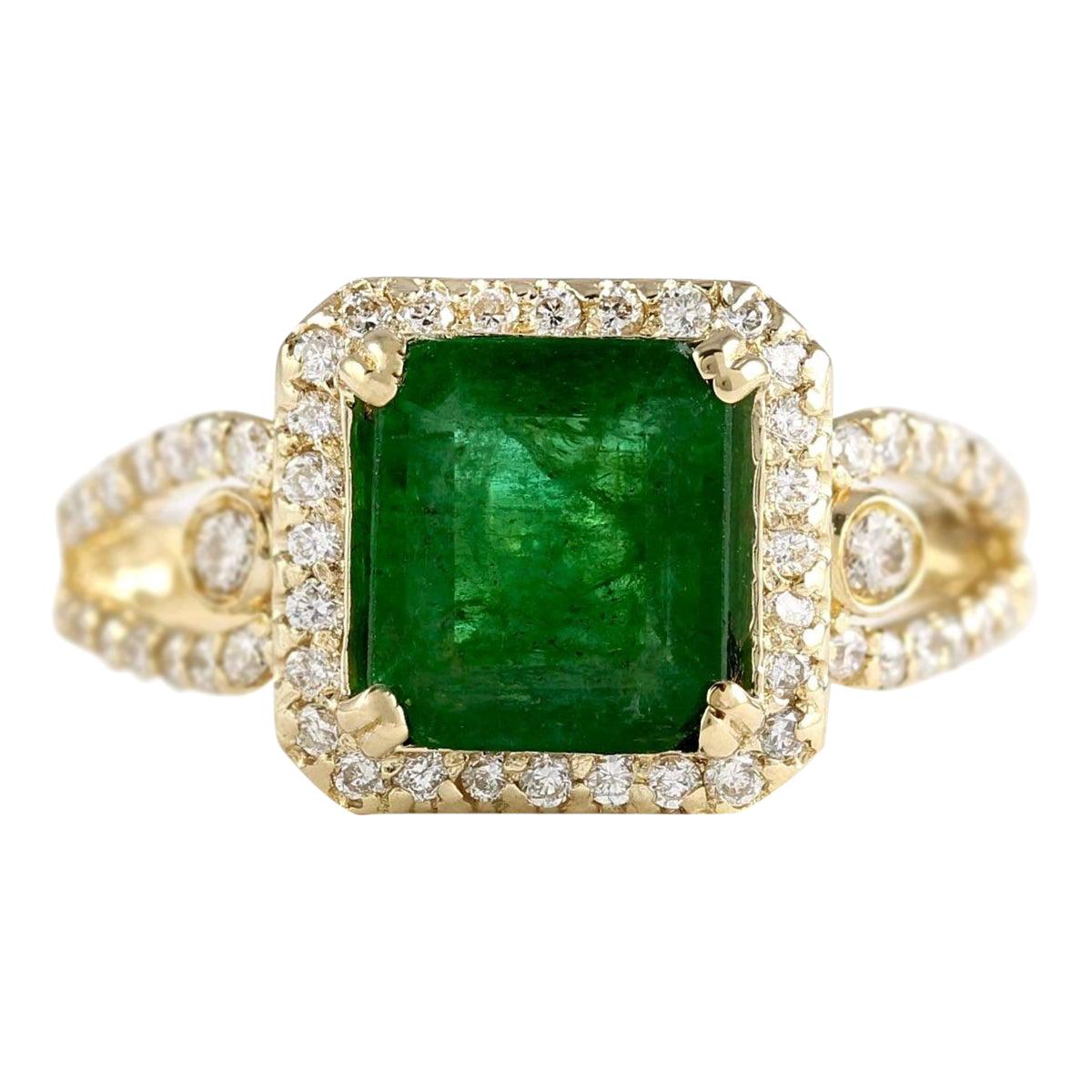 Natural Emerald 14 Karat Yellow Gold Diamond Ring For Sale