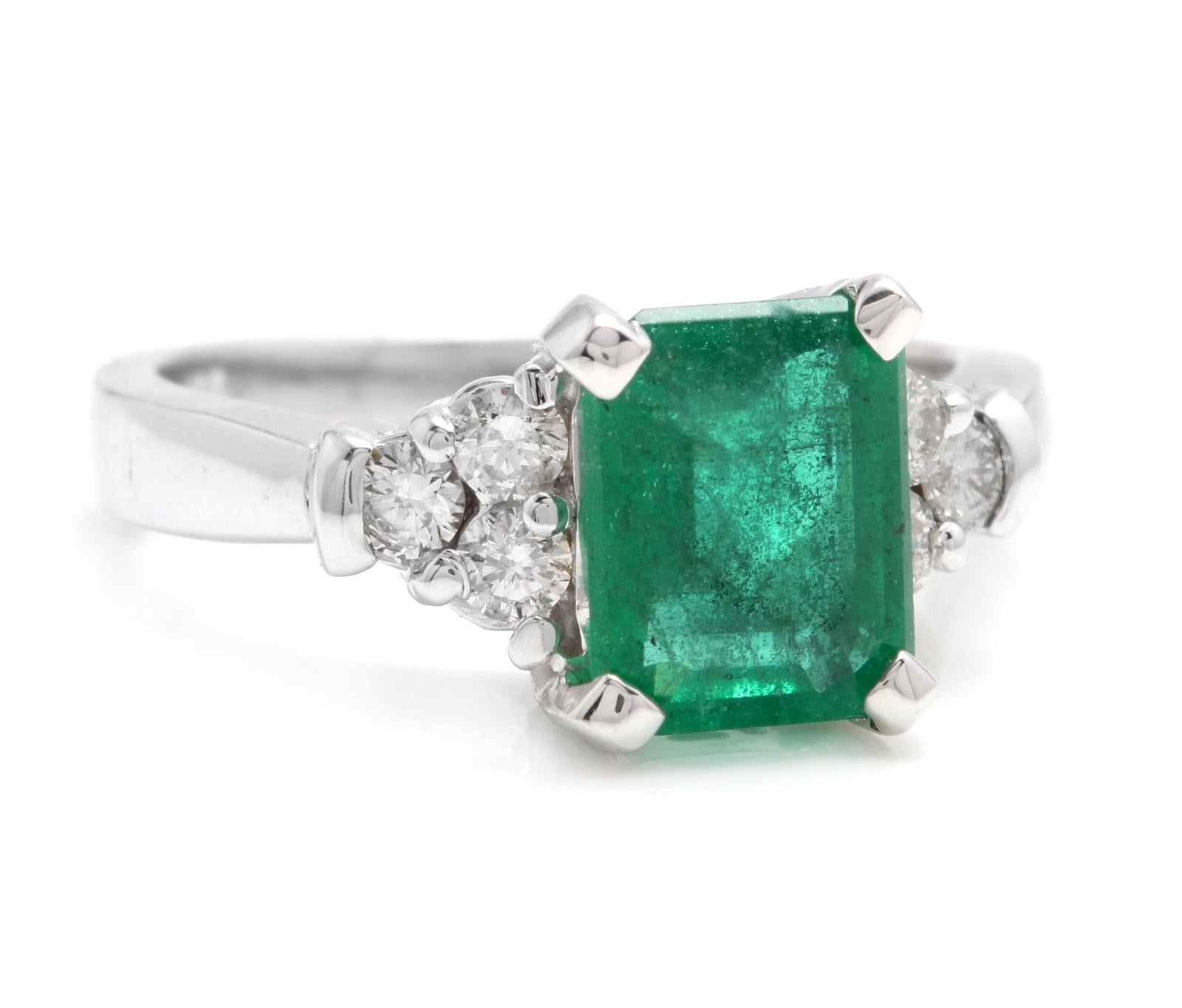 2.90 Carats Natural Emerald and Diamond 14K Solid White Gold Ring

Total Natural Green Emerald Weight is: Approx. 2.60 Carats (transparent)

Emerald Measures: Approx. 9 x 7mm

Emerald Treatment: Oiling

Natural Round Diamonds Weight: Approx. 0.30