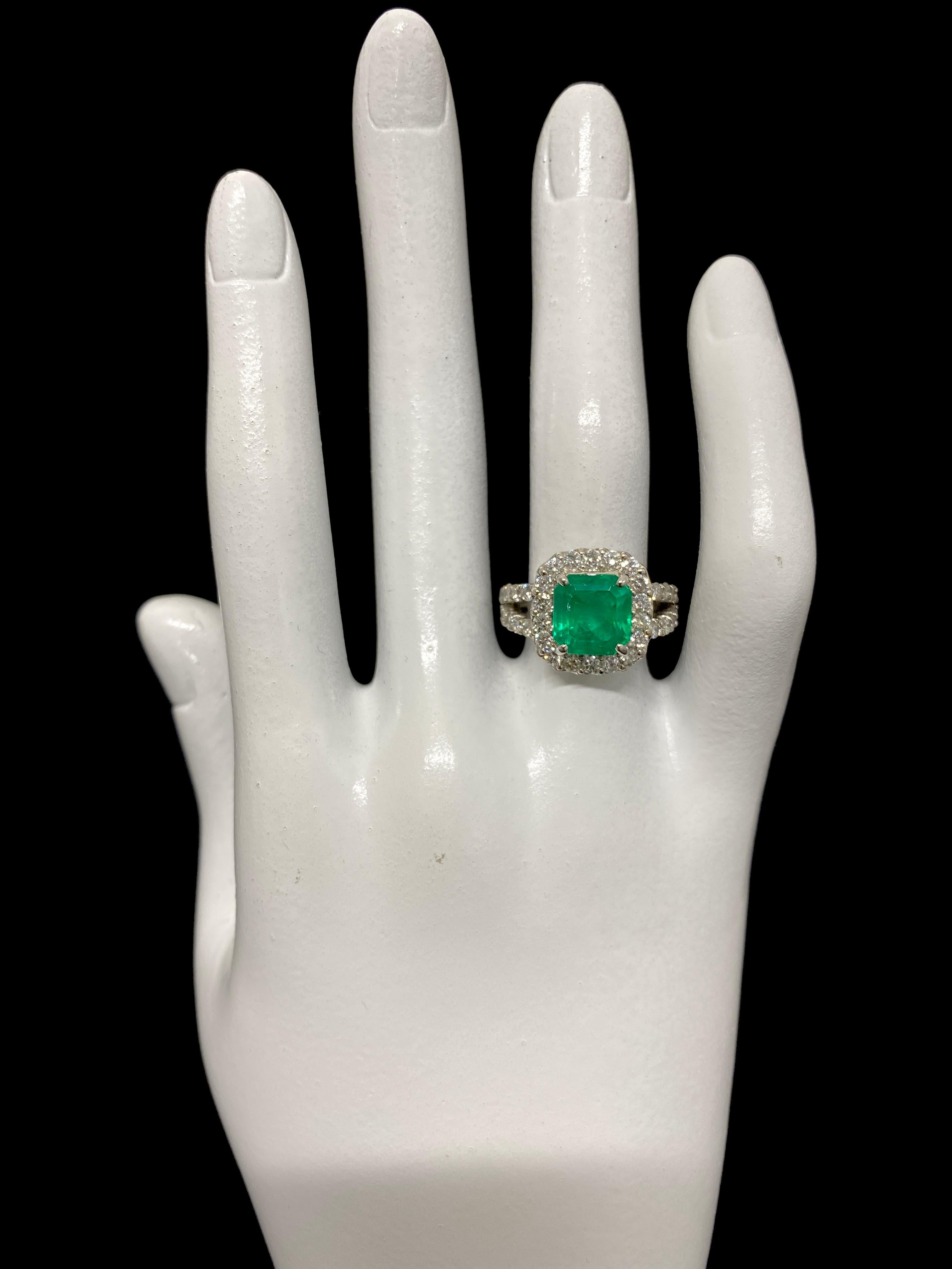 2.90 Carat Natural Emerald and Diamond Halo Ring Set in Platinum 1