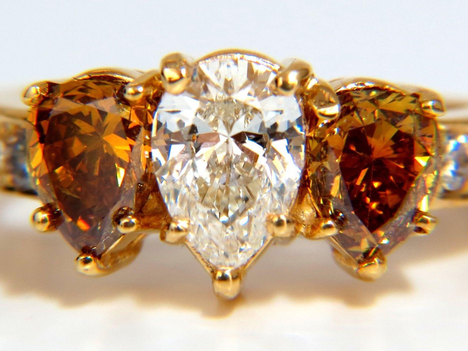 Pear Cut 2.90 Carat Natural Fancy Vivid Yellow Brownish Diamond Pear Shape Ring 18 Karat For Sale