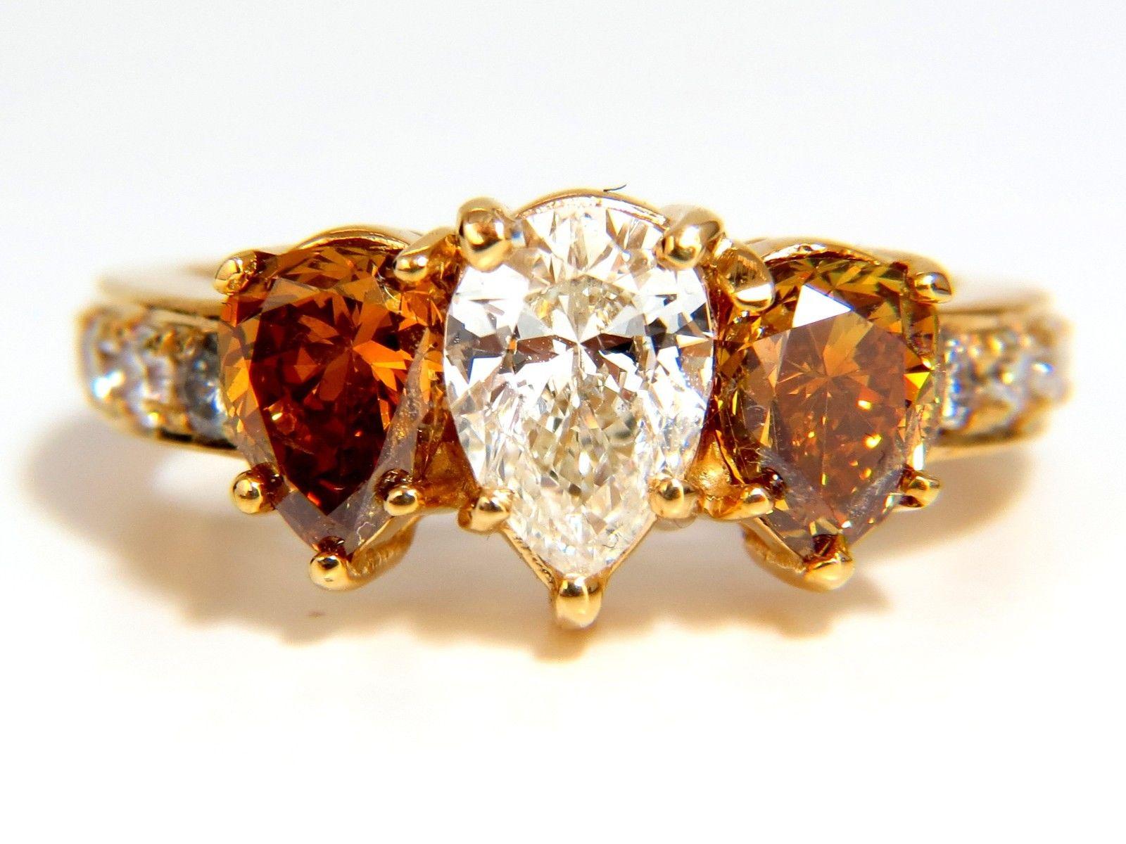 Women's or Men's 2.90 Carat Natural Fancy Vivid Yellow Brownish Diamond Pear Shape Ring 18 Karat For Sale