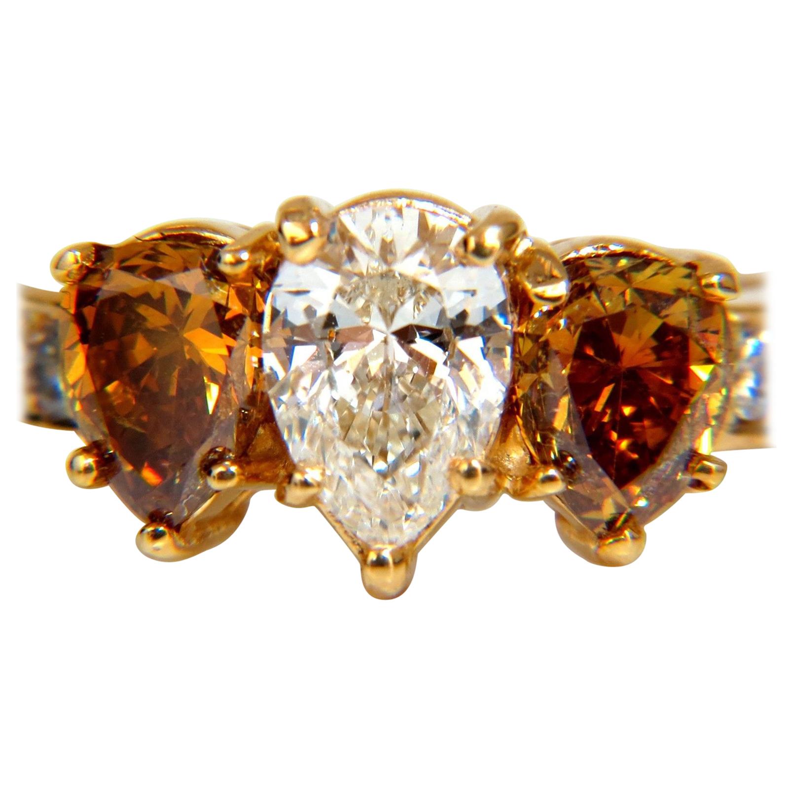 2.90 Carat Natural Fancy Vivid Yellow Brownish Diamond Pear Shape Ring 18 Karat For Sale
