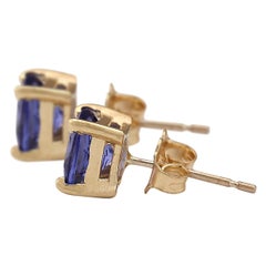 Tanzanite Earrings In 14 Karat Yellow Gold