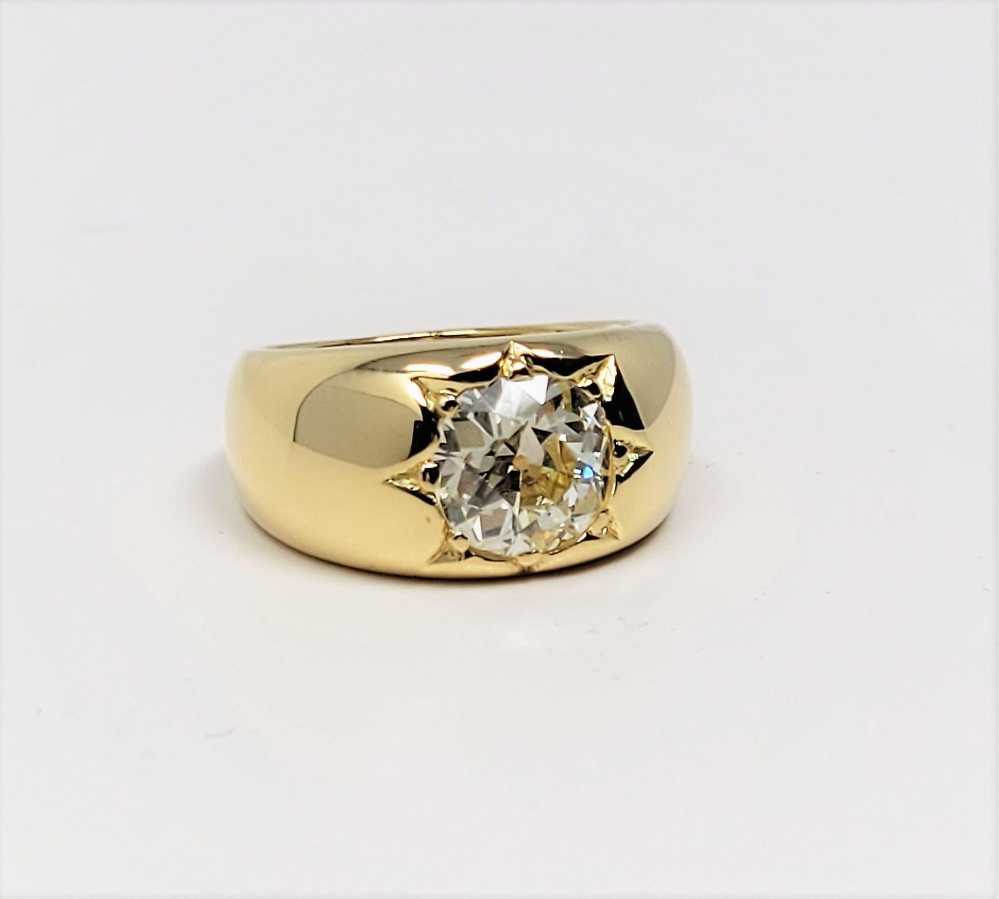 This beautiful 2.90 carat, old European-cut diamond is complimented by the 18 karat yellow gold, tapering, highly polished mounting.  The stone measures 9.22 mm x 9.66 mm x 5.02 mm and as is common with some of the older cuts from early 20th