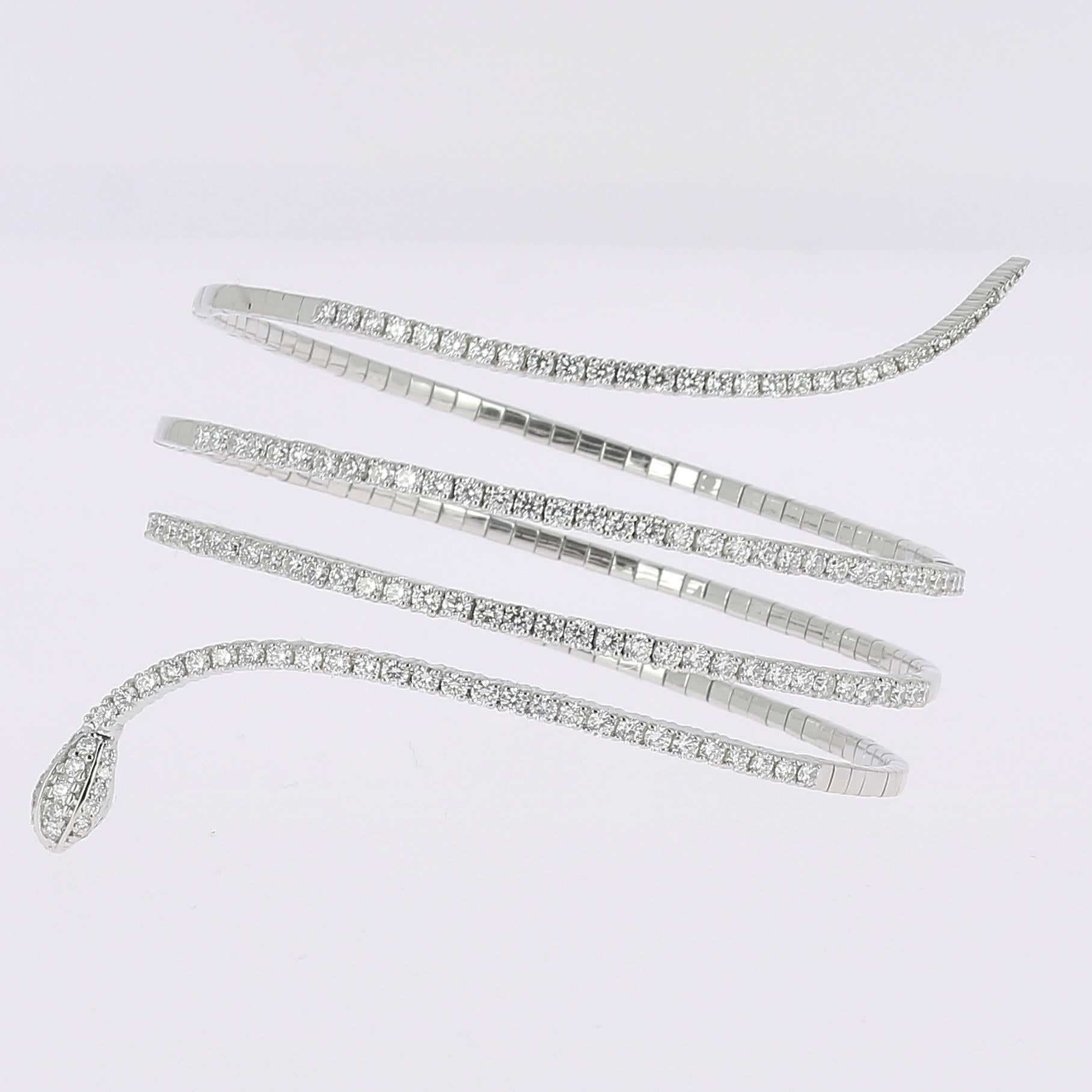 The Snake Diamond Bracelet is a masterpiece, paved with round diamonds on all the body of Snake.
The Diamond bracelet is set with 2.90 Carats and weight 20.90 Grams.
The Diamond Bracelet will come in a beautiful box ready for gifting.

HERITAGE