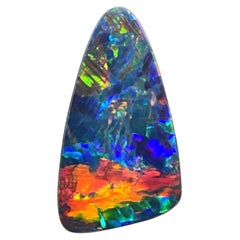 2.90 Carats Australian Opal Orange blue green multiple play of color gemstone