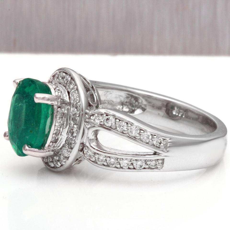 2.90 Carats Natural Emerald and Diamond 14K Solid White Gold Ring

Total Natural Oval Cut Emerald Weight is: 2.40 Carats (transparent high quality)

Emerald Measures: 9.67 x 7.74mm

Natural Round Diamonds Weight: .50 Carats (color G / Clarity