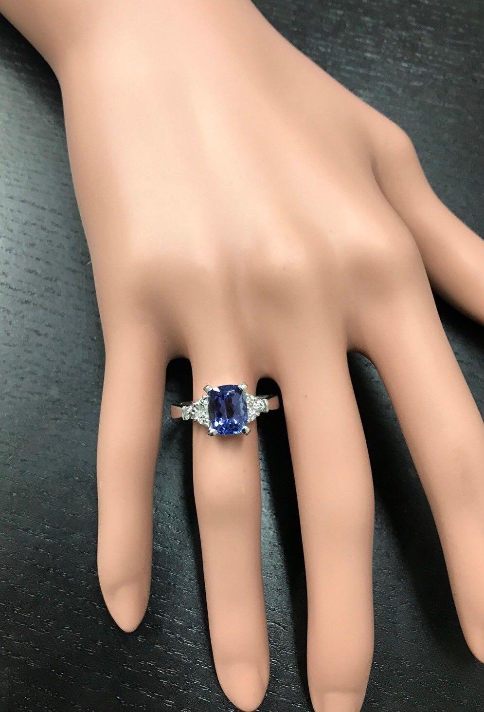 Women's 2.90 Carat Natural Very Nice Looking Tanzanite and Diamond 14K Solid White Gold For Sale
