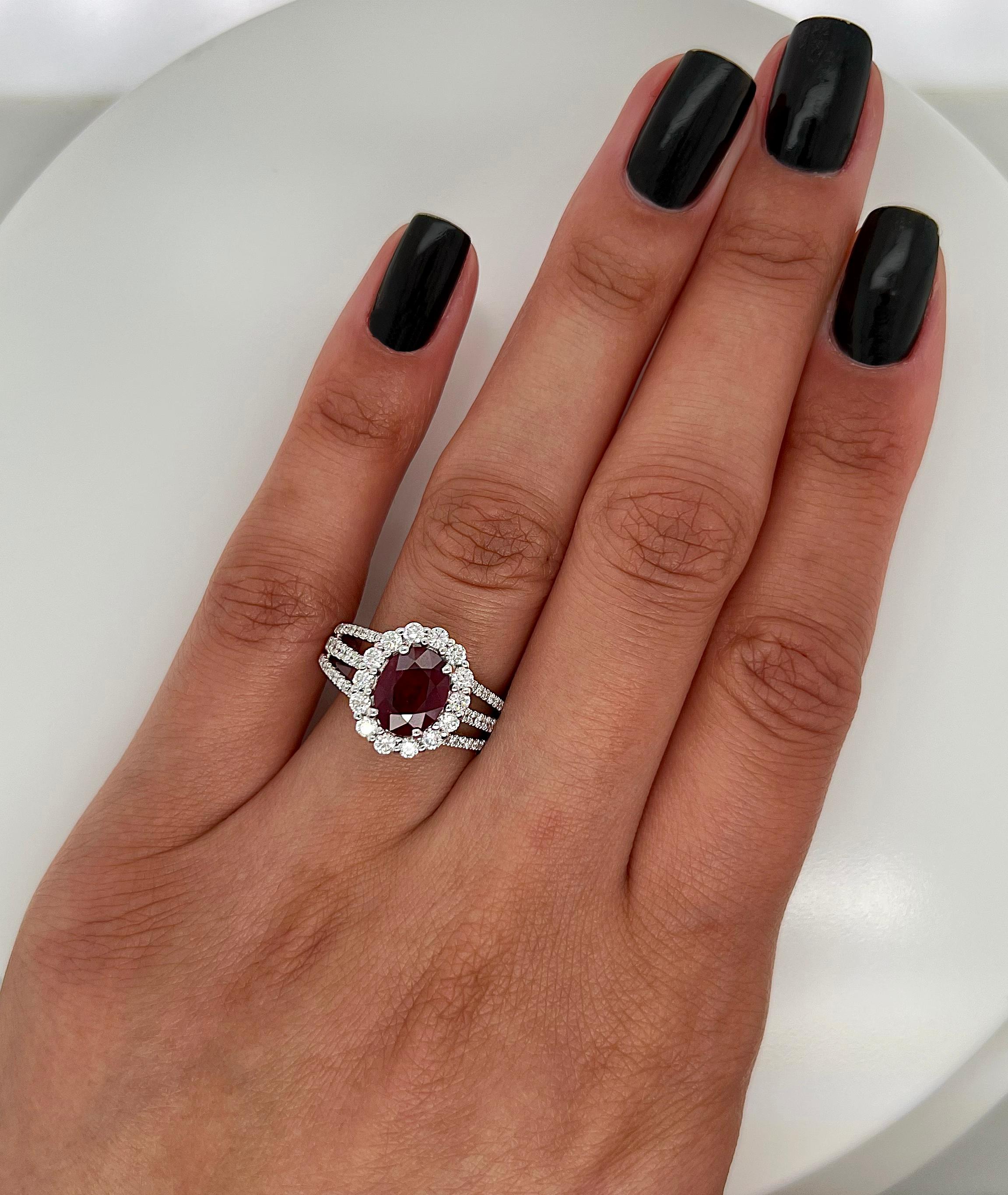 Oval Cut 2.90 Total Carat Oval Ruby and Diamond Halo Ladies Ring. GIA Certified. For Sale