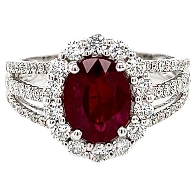 2.90 Total Carat Oval Ruby and Diamond Halo Ladies Ring. GIA Certified.