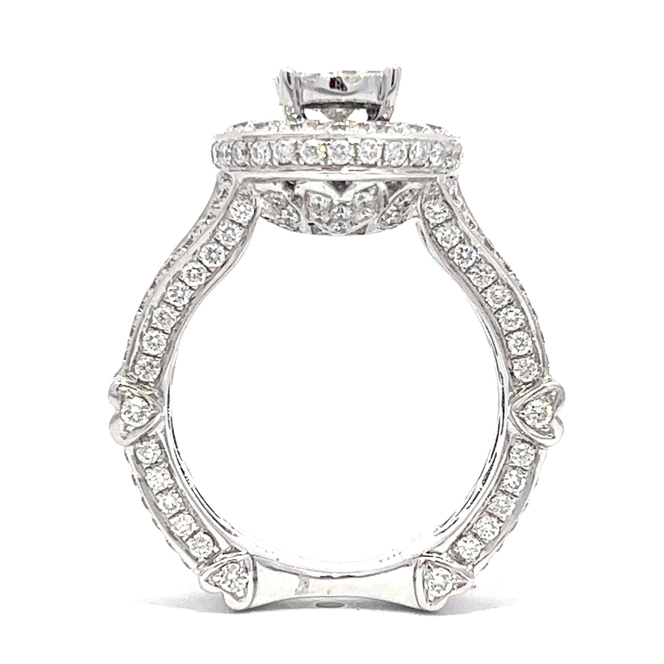 This 18k white gold engagement ring boasts a stunning 2.90ct equivalent of round brilliant diamonds in g-h color and vs2-si clarity.