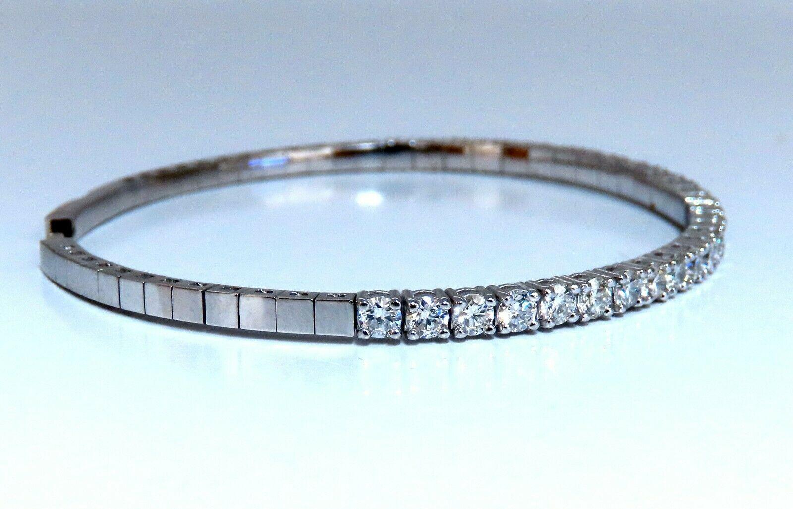 2.90ct natural diamonds tennis Flex / bangle bracelet

Beautiful flush set / smooth finish

Rounds & Full cut.

G-color & Vs-2 clarity.

14kt. white gold 

9.8 Grams.

3.77 mm wide

7 - 7.25 inch (wearable length)

Inner measurement: 2.25 x 2