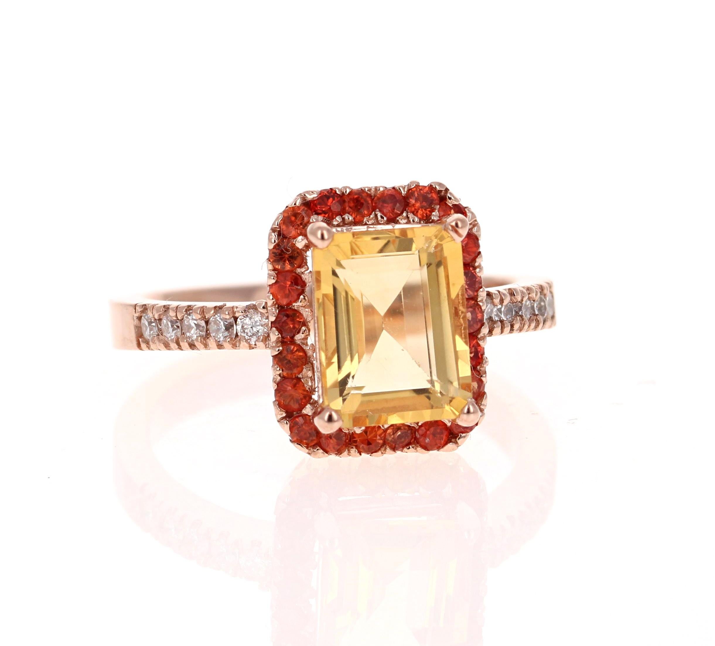 This gorgeous ring has a beautiful Emerald Cut Citrine Quartz weighing 2.23 Carats and is surrounded by a Halo of 22 Round Cut Orange Sapphires weighing 0.50 Carats.  Along the shank of the ring are 10 Round Cut Diamonds that weigh 0.18 Carats