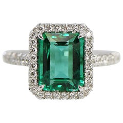 2.91 Carat Emerald Cut Green Emerald and Diamond Ring