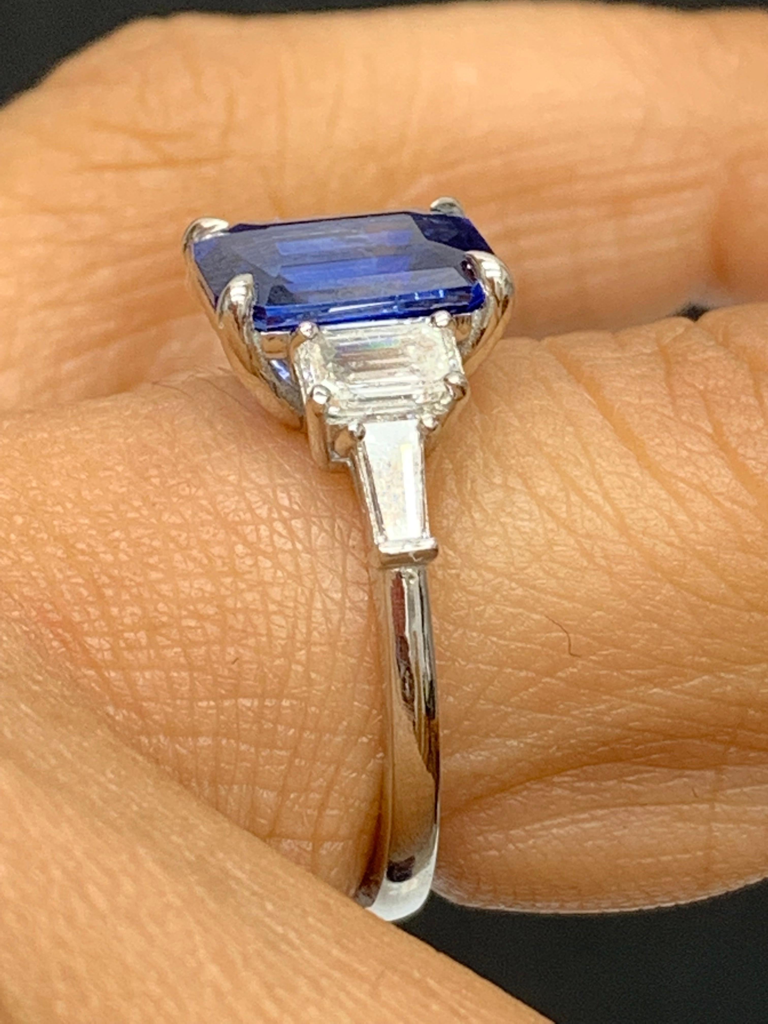 emerald cut diamond ring with sapphire side stones