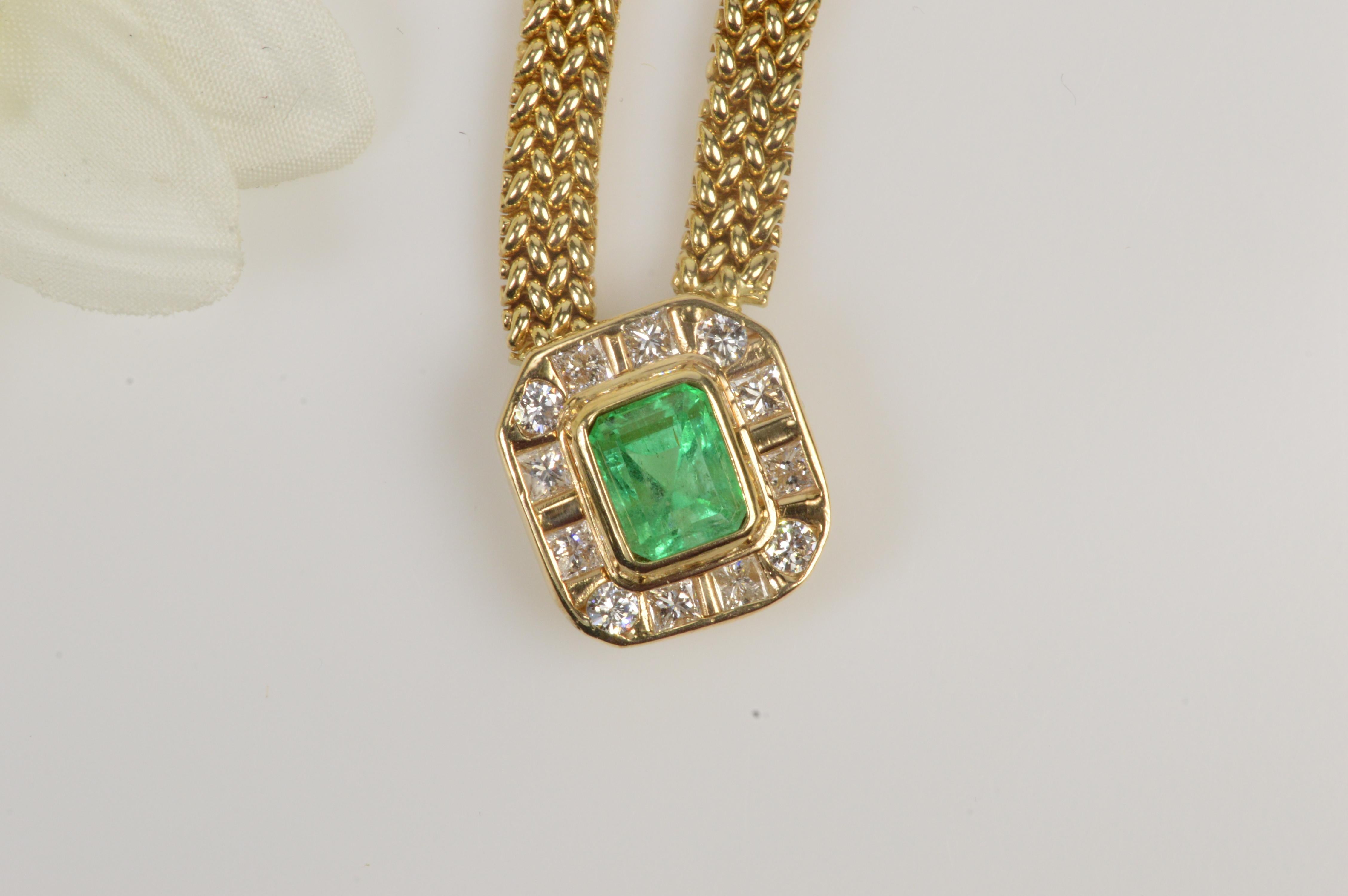 This emerald and diamond halo statement piece is sure to turn heads with its bold design and classic styling.  All diamonds are graded according to GIA grading standards  
·Item: 14K 2.91 CT Emerald 0.88 CTW Diamond Halo Pendant Link Necklace 16.25