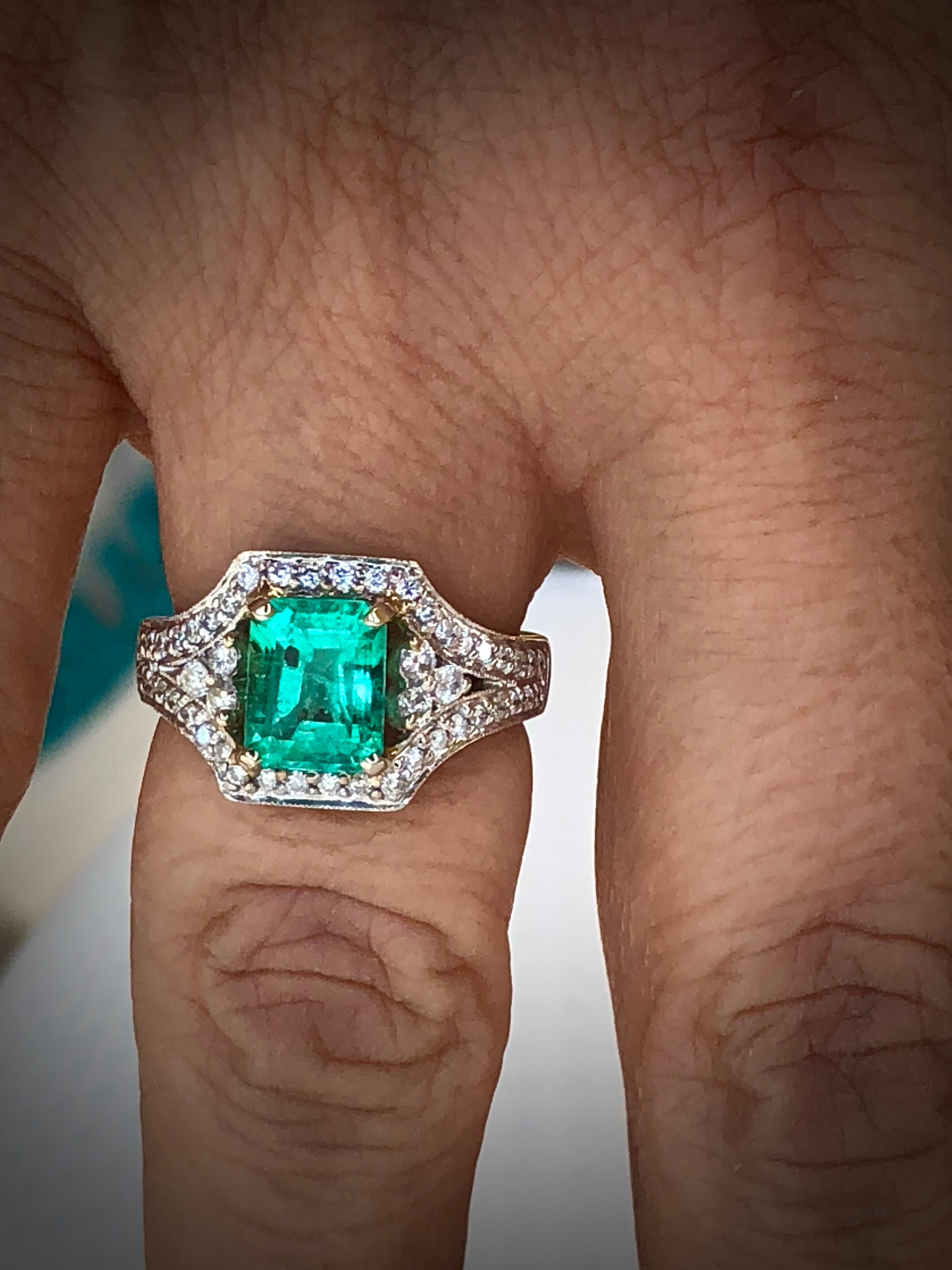 Vintage emerald engagement ring 100% natural Colombian emerald, emerald cut, medium-light green/ clarity VS, emerald weighting 2.25 carats, accented with diamonds 0.66cts G/SI2.
Total gemstones weight:  2.91 carats. solid, 18k white gold.
Ring