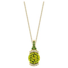 2.91 Carat Peridot Pendant in 18Karat Yellow Gold with Tsavorite and Diamond.