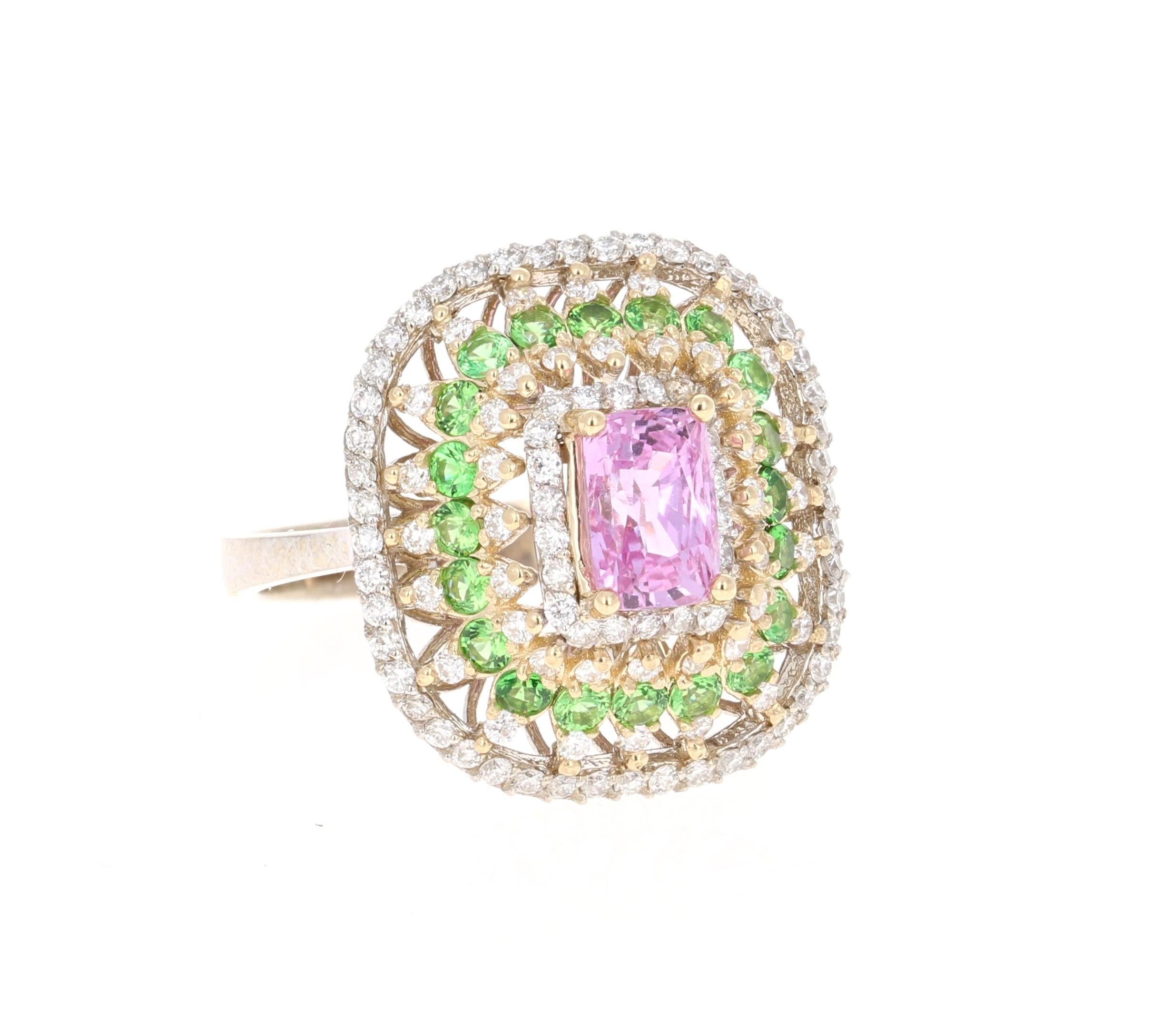This ring has a Emerald Cut Pink Sapphire that weighs 1.49 Carats. The Pink Sapphire has a GIA Certificate: #1192204377.
The ring is embellished with 112 Round Cut Diamonds that weigh 0.77 Carats (Clarity: VS, Color: F) as well as 20 Tsavorites that