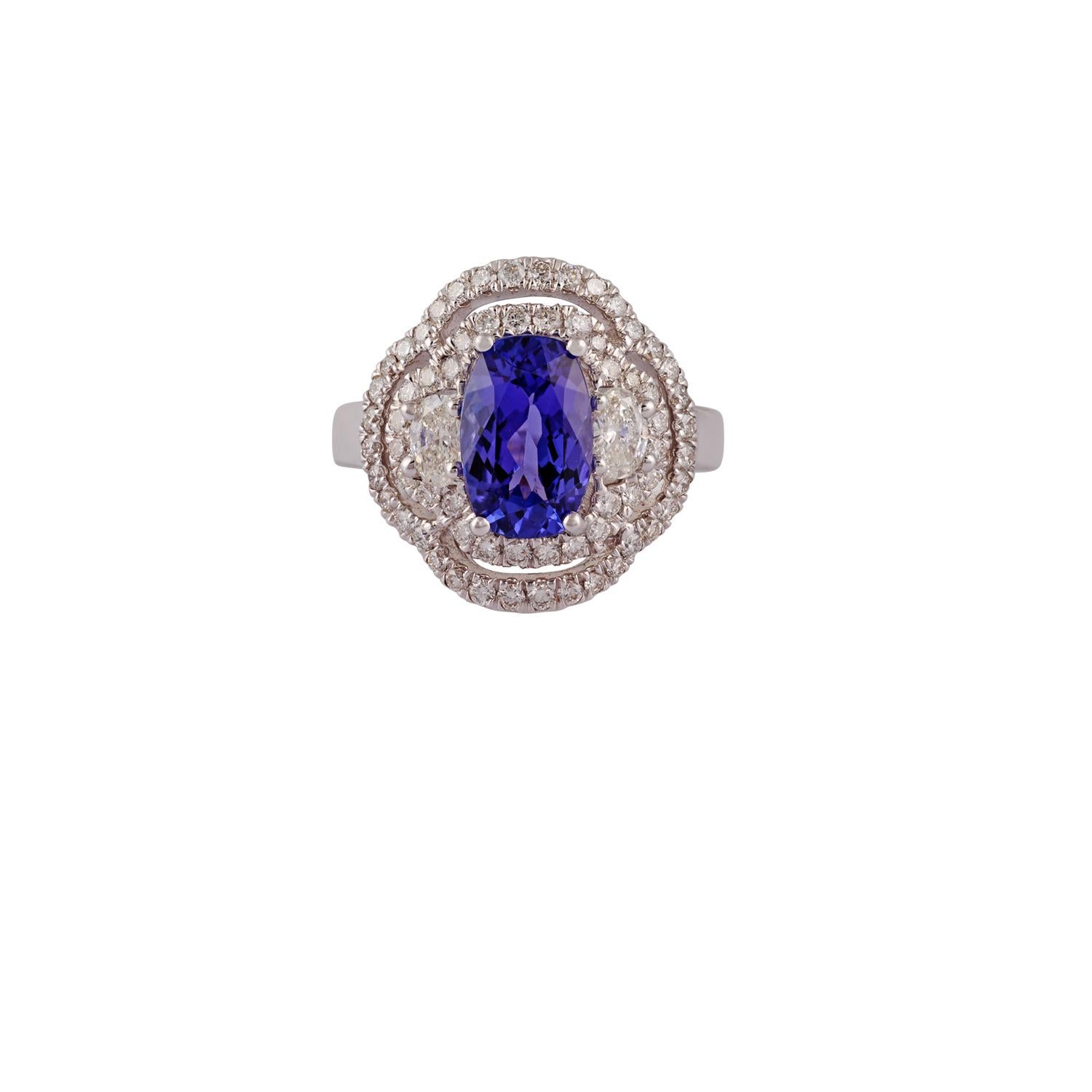 This is an exclusive tanzanite & diamond ring studded in 18k white gold features 1 piece of tanzanite weight 2.91 carat with different shapes of diamond weight - 1.40 carat (combined weight of all diamonds) this entire ring is made of 18k white gold