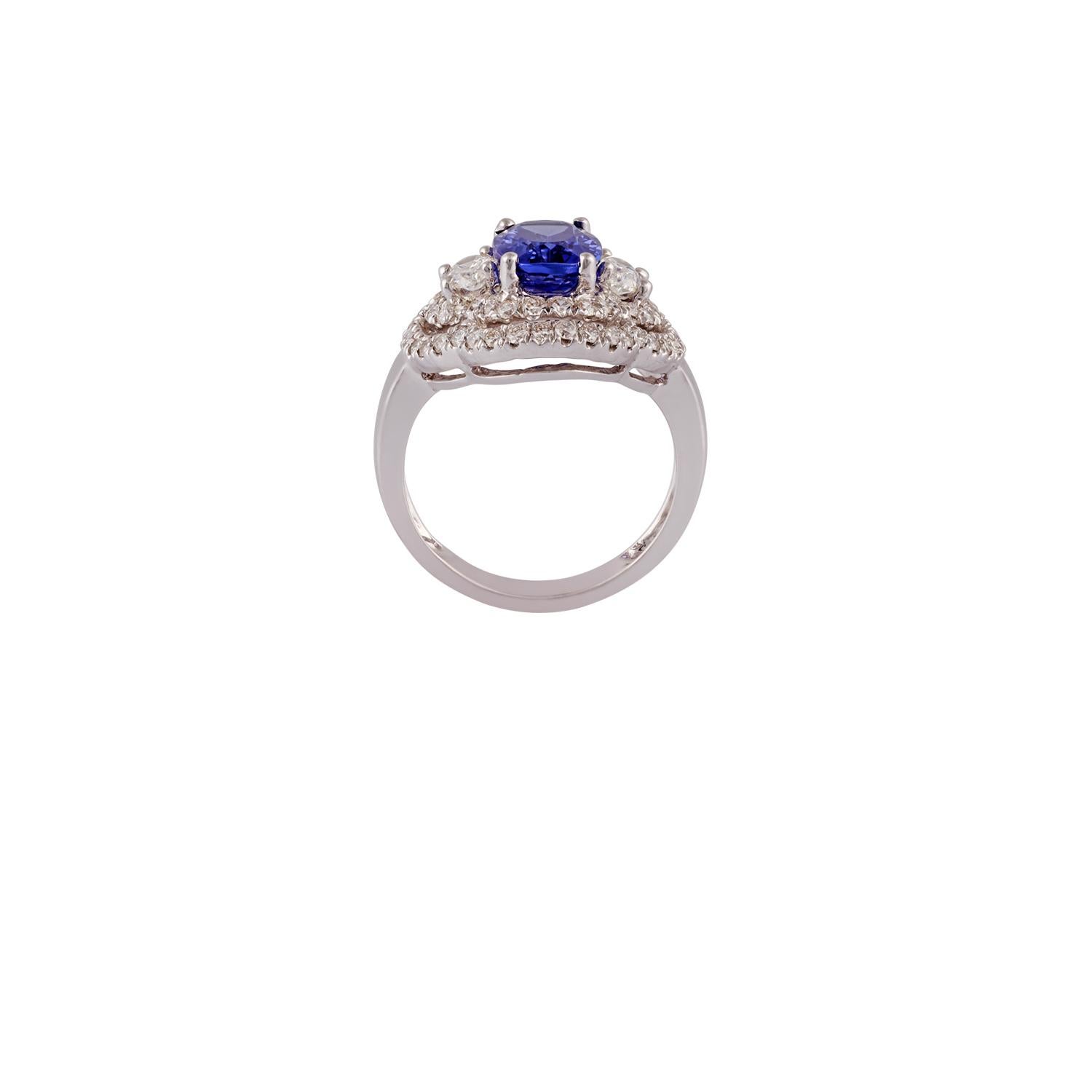 Contemporary 2.91 Carat Tanzanite & Diamond Ring Studded in 18K White Gold For Sale