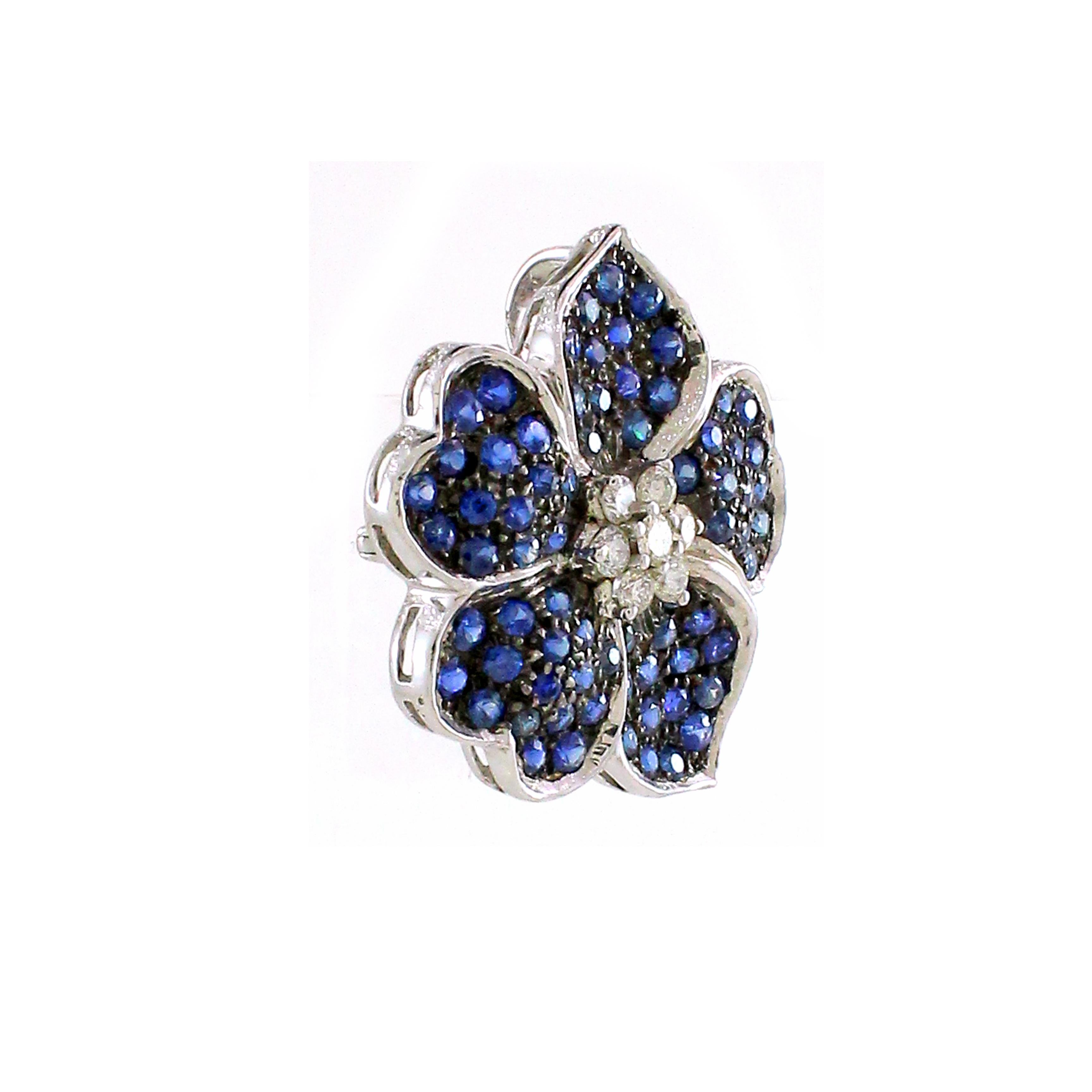 Step into a world of timeless elegance with our exquisite brooch, meticulously crafted from radiant 18k white gold, boasting a weight of 11.36 grams. Created from 2.91 carats of ethereal Ceylon blue sapphires, each meticulously cut to capture their