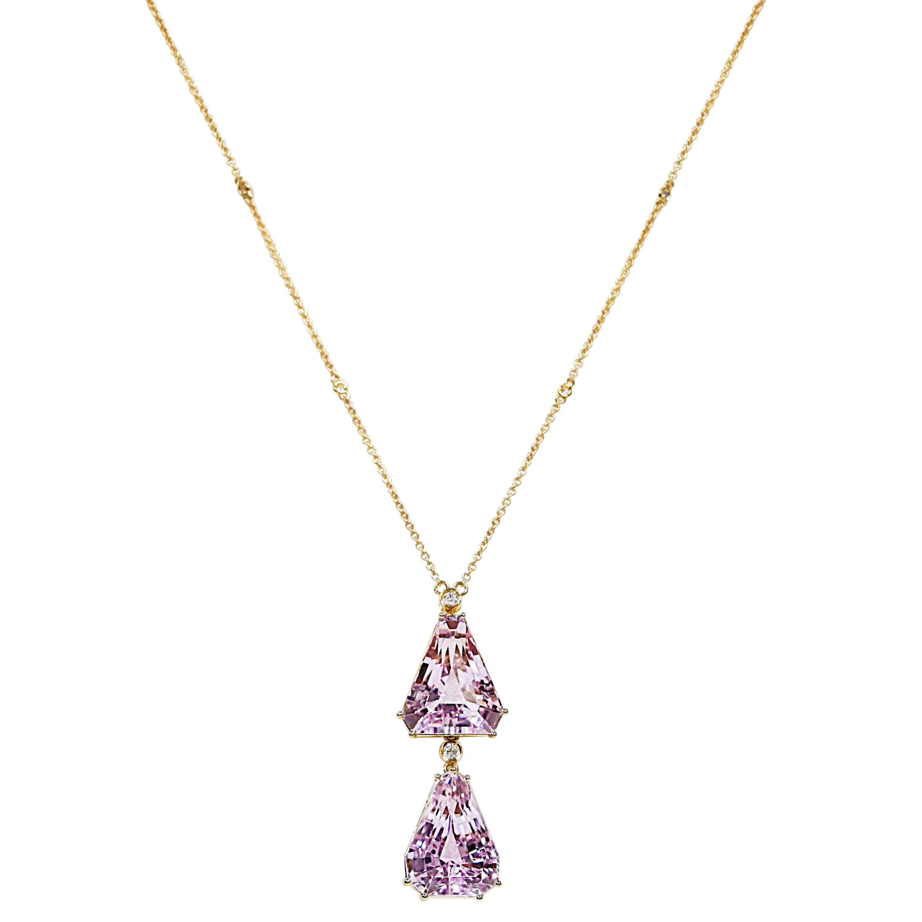 2 Kunzite Gemstones: 28.94 Carats
6 White Diamonds: 0.23 Carat, Round Cut
Metal: 18K Yellow Gold, 9 Grams