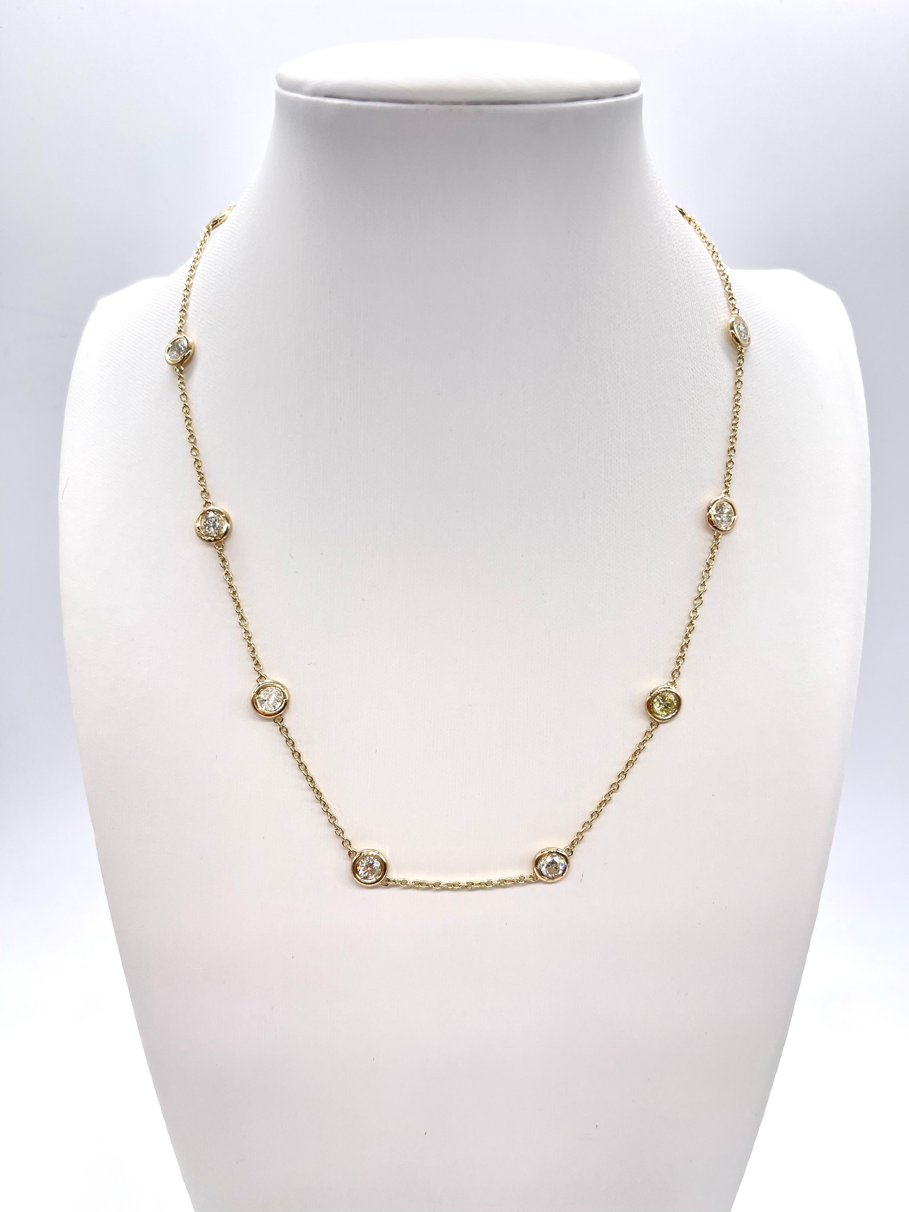 10 Station Diamond by the yard necklace set in Italian made 14K yellow gold. 
Total weight is 2.92 carats. Beautiful shiny stones. 
Length 16 inch 6.64 grams. Average H-I,SI Natural Diamond

*Free shipping within U.S*