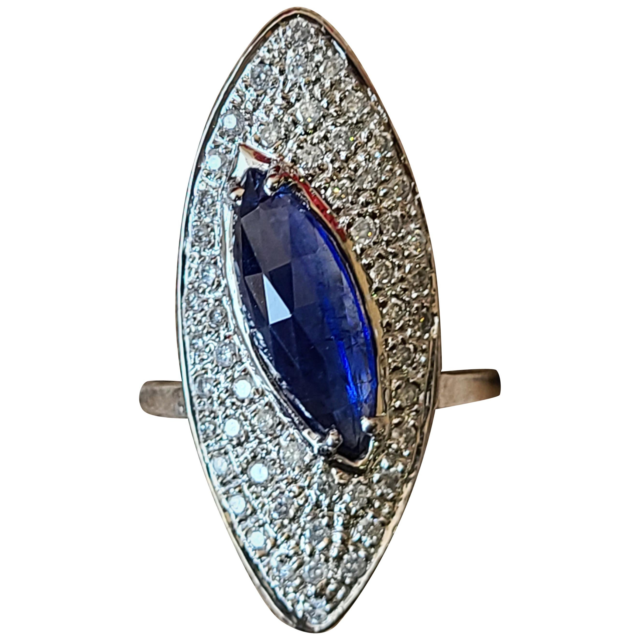 2.92 Carat Blue Sapphire Ring Set in 18 Karat Gold with Diamonds