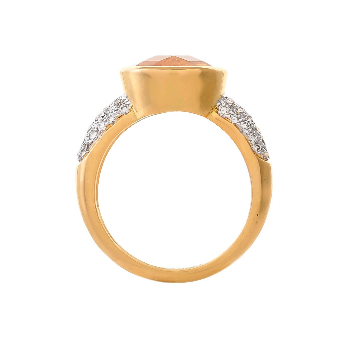 Design to encourage love this beautiful ring features oval-shaped citrine weighing approximately 2.92 carats, inserted within a yellow gold bezel on a tapering band of 18 karats yellow gold pave set with round diamonds weighing approximately 0.44
