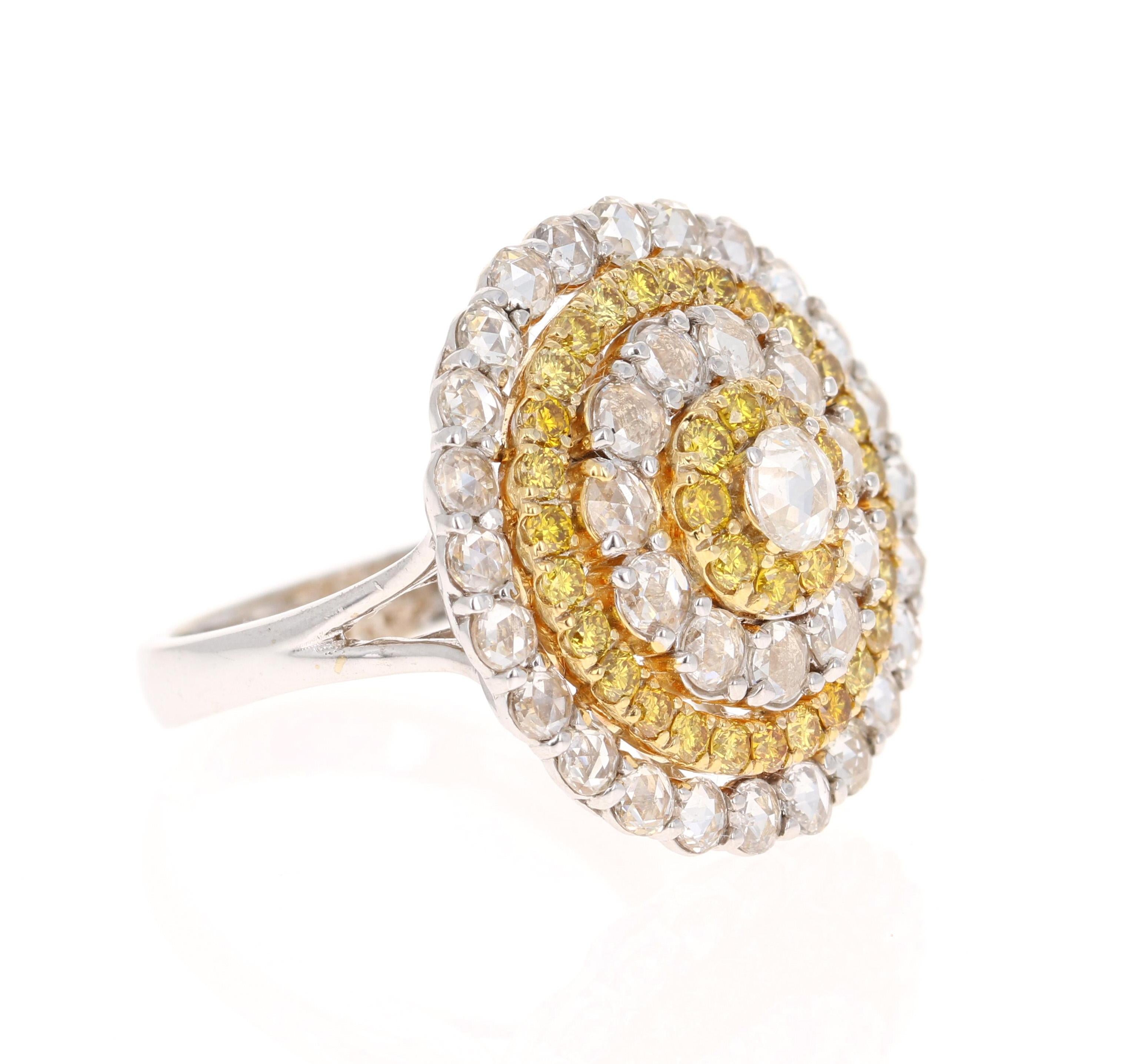This magnificent beauty has a dome of 36 Rose Cut Diamonds that weigh 1.94 Carats. The clarity and color of the rose cuts are VS-F. It also has 36 natural Yellow Round Cut Diamonds that weigh 0.98 Carats. The clarity of the yellow diamonds are VS.