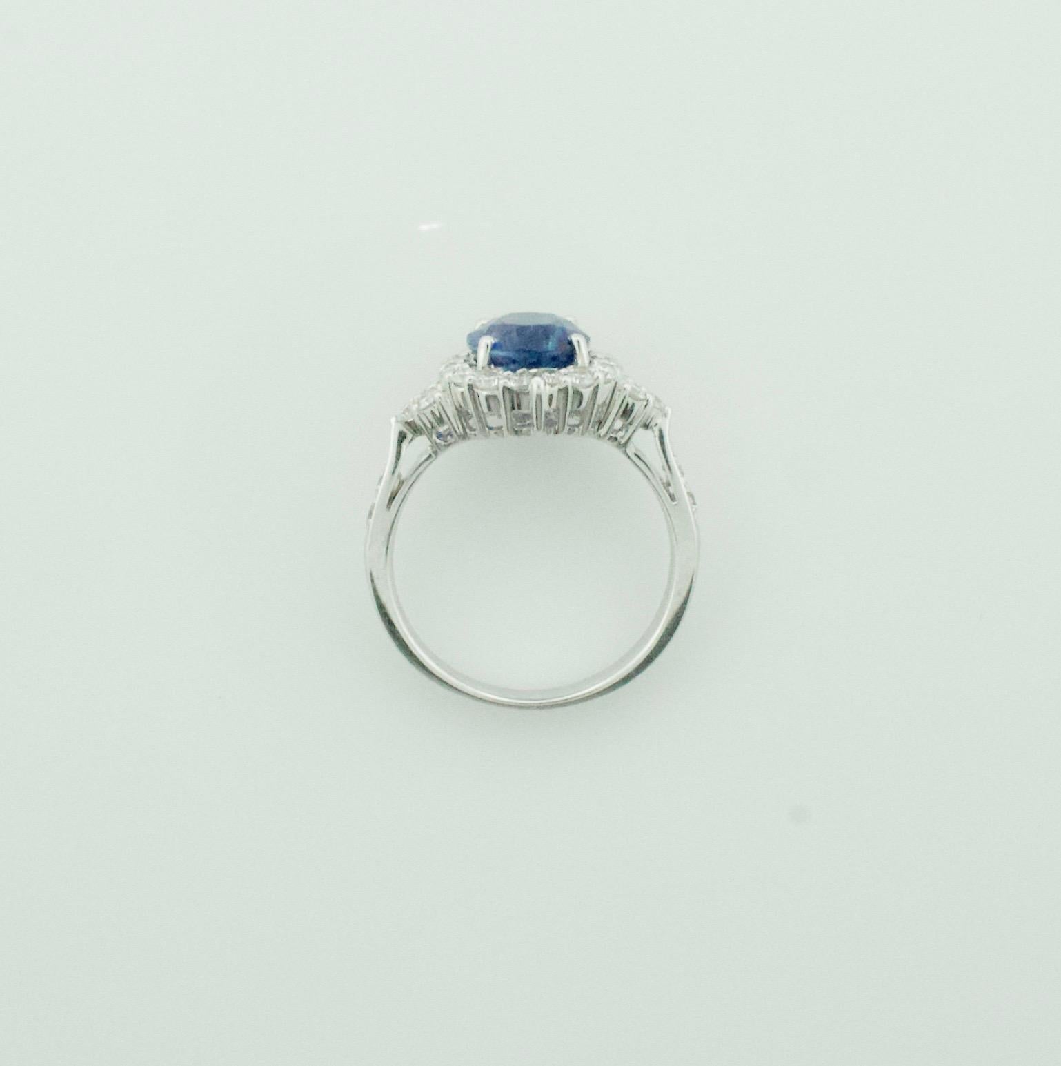 2.92 Carat Sapphire and Diamond Ring in 18k GIA Certified
One Oval Cut Sapphire Weighing 2.92 Carats GIA Certified
26 Round Brilliant Cut Diamonds Weighing .60 Carats [GH VVS-VS] Very Fine
