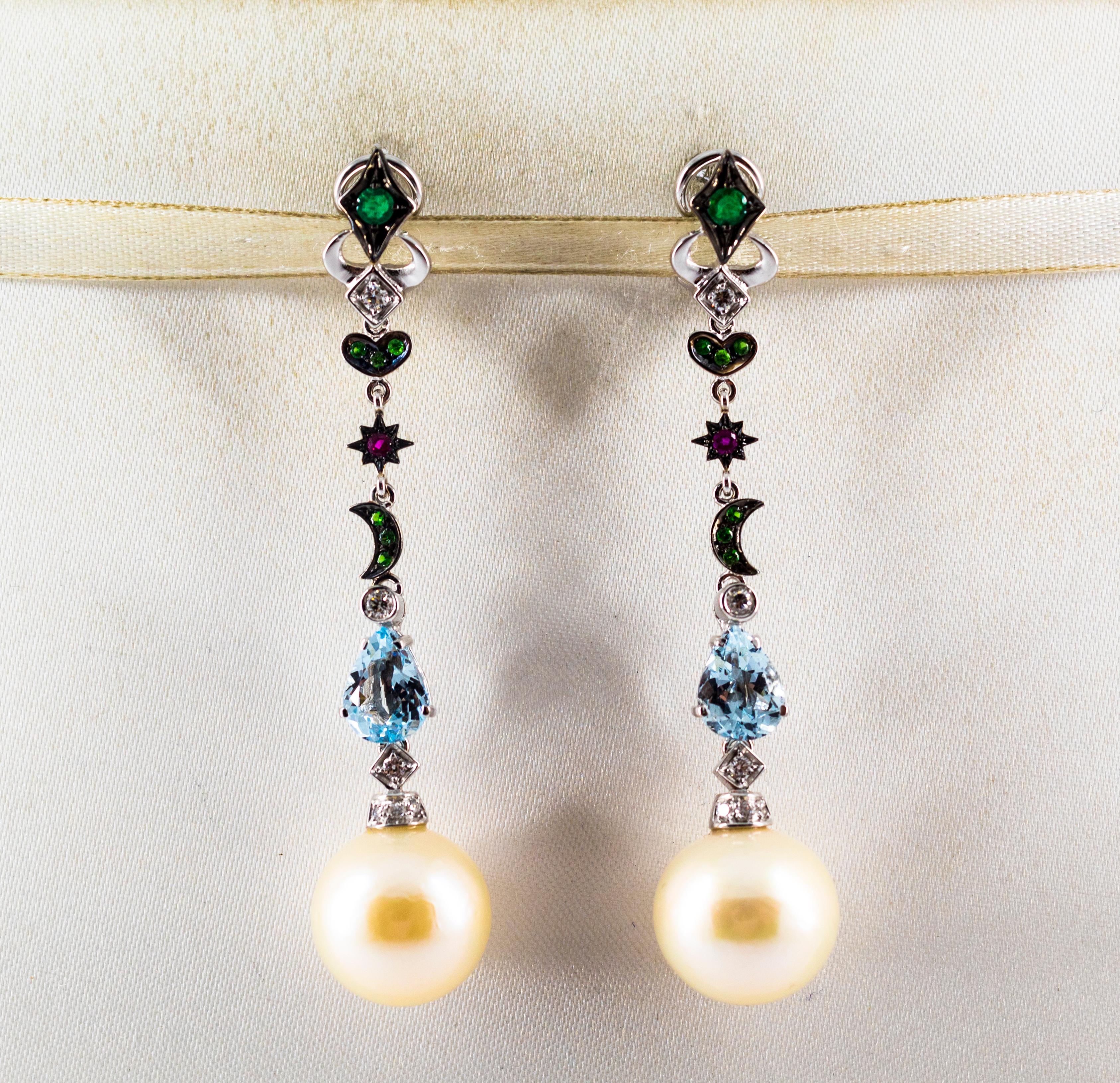 These Clip-On Earrings are made of 18K White Gold.
These Earrings have 0.27 Carats of White Diamonds.
These Earrings have 0.40 Carats of Emeralds.
These Earrings have 0.05 Carats of Rubies.
These Earrings have 2.20 Carats of Aquamarine.
These
