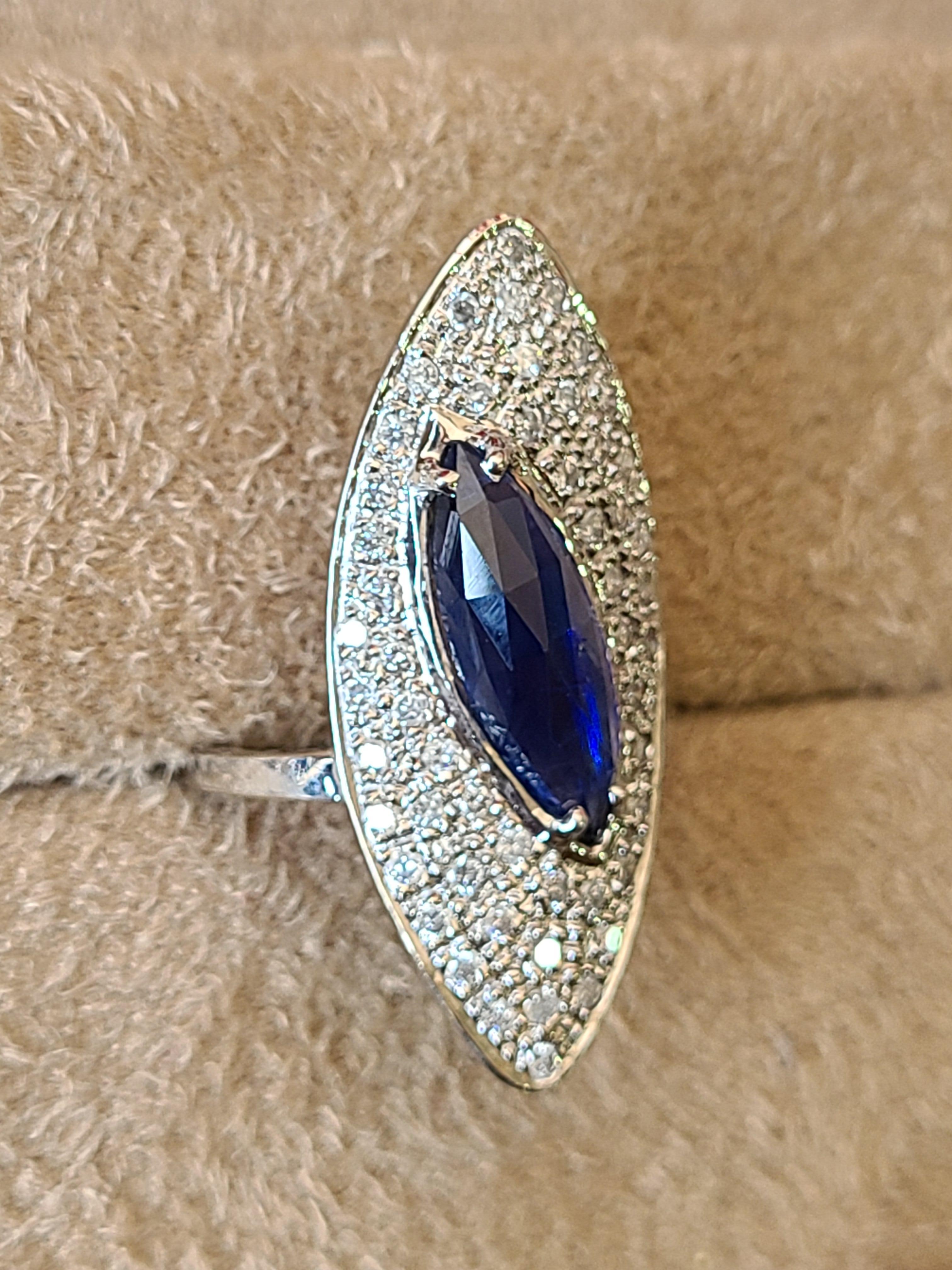 Anglo-Indian 2.92 Carat Blue Sapphire Ring Set in 18 Karat Gold with Diamonds