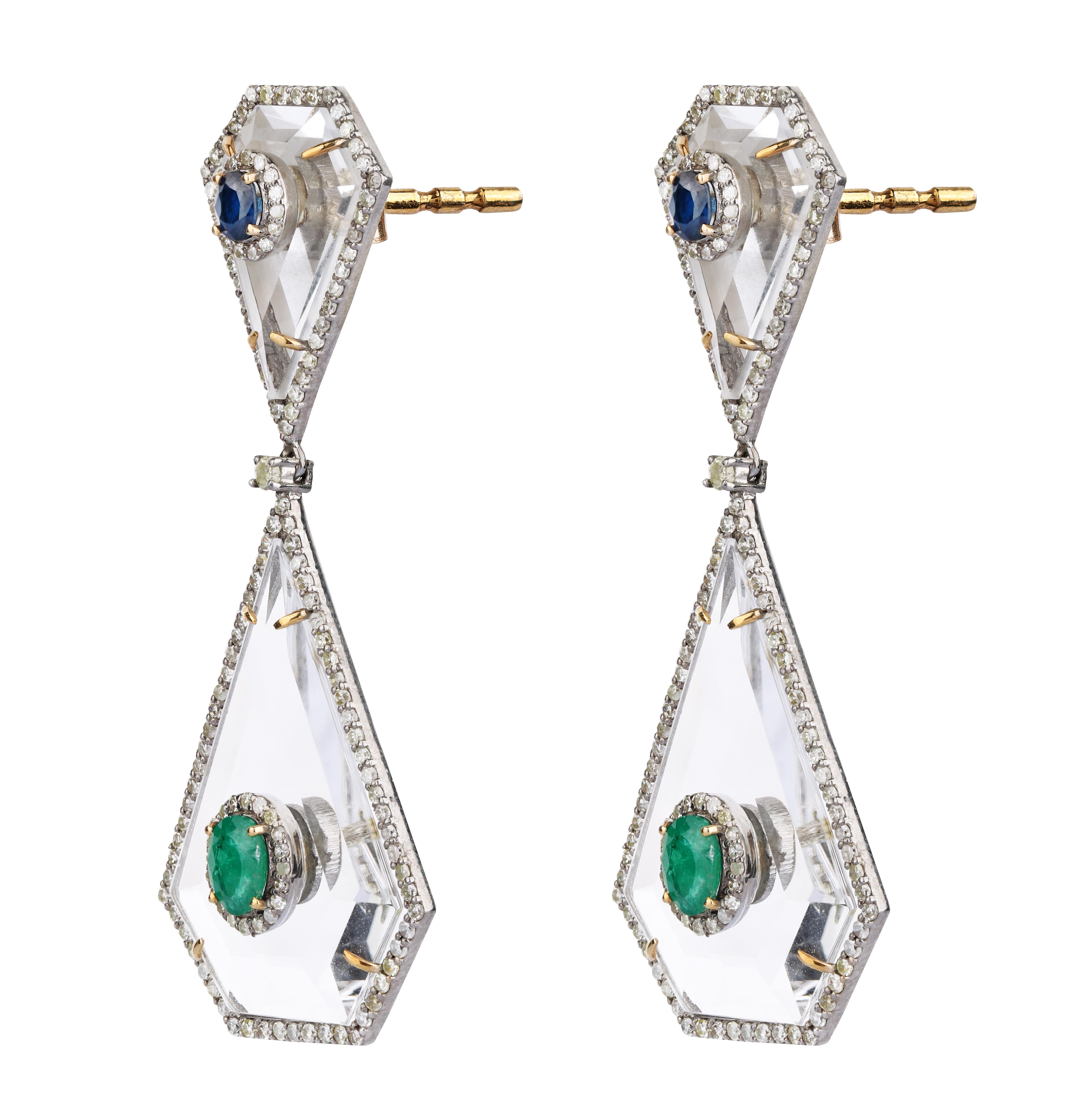 29.20 carats Crystal, Diamond, Emerald, and Sapphire Dangle Earrings

We are here to make you return to the lingering memories that echo in the vast suitcase of happiness. The time when you wore an exquisite pair of earrings and witnessed them