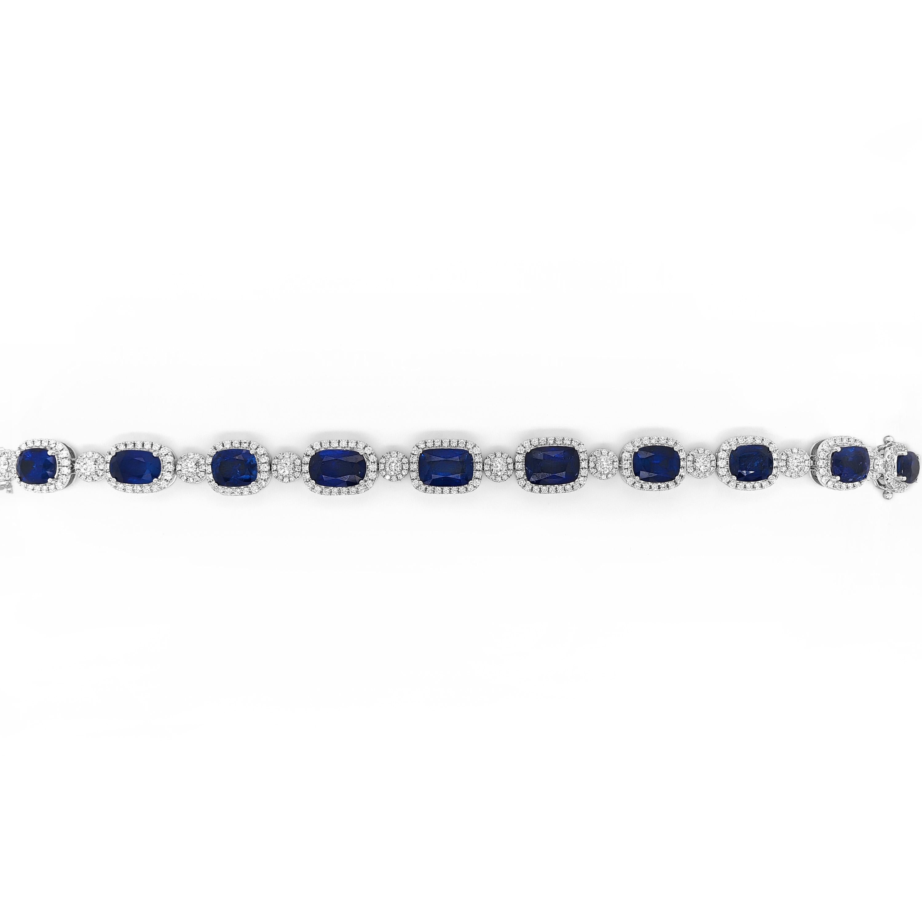 10 Sapphire Gemstones: 25.98 Carats
120 White Diamonds: 0.46 Carat
220 White Diamonds: 2.81 Carat
Metal: 18K White Gold, 28.60  Grams

GIA Certificate # 5231495038
