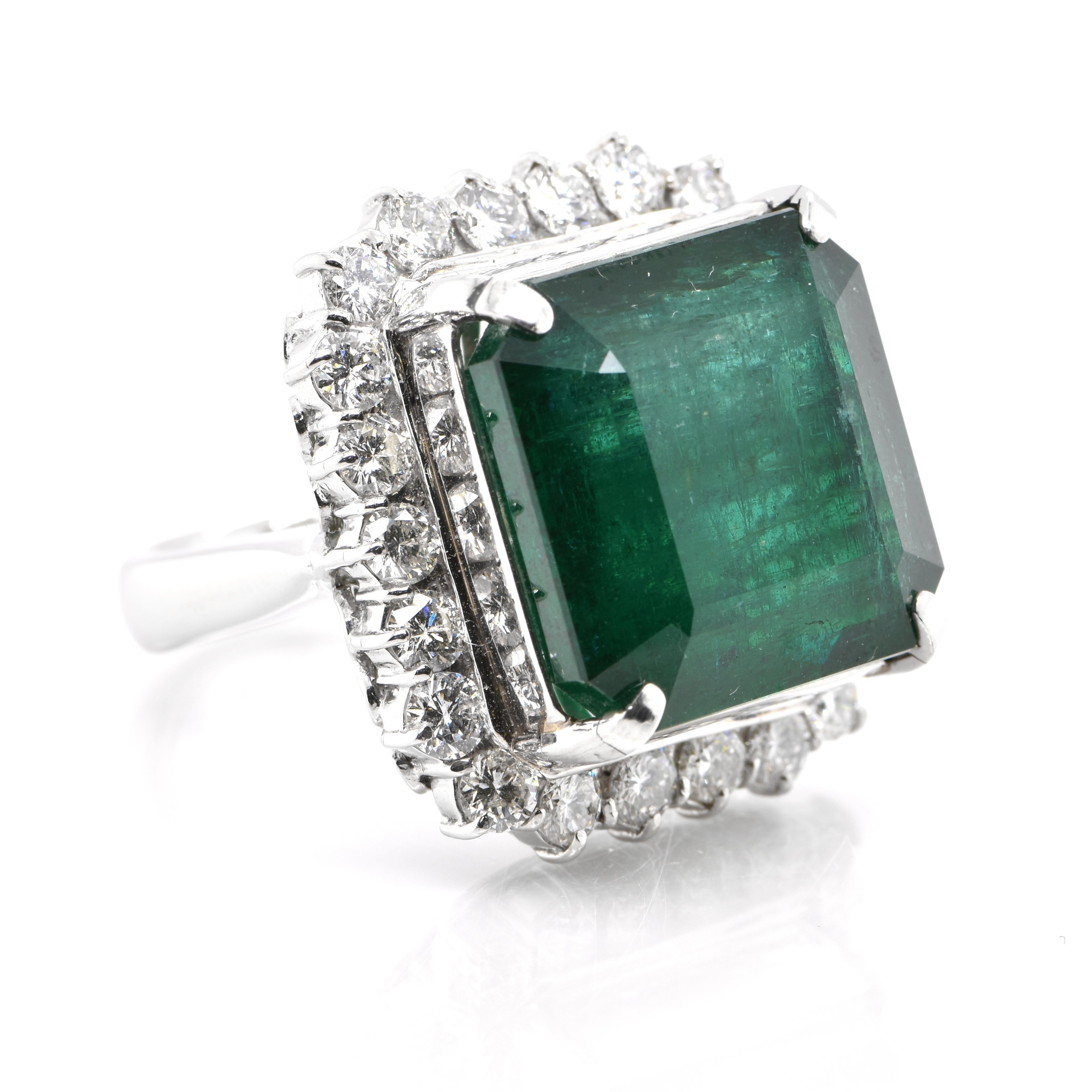 A stunning cocktail halo ring featuring a 29.29 Carat Natural Emerald and 2.81 Carats of Diamond Accents set in Platinum. People have admired emerald’s green for thousands of years. Emeralds have always been associated with the lushest landscapes