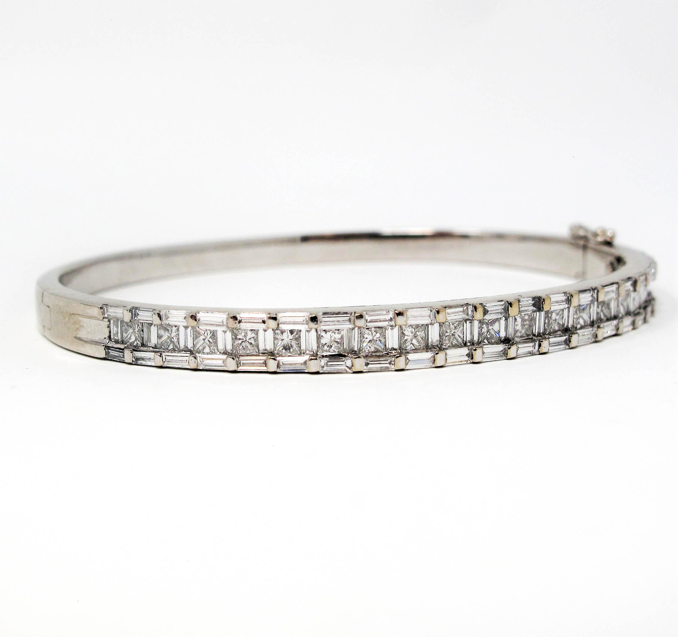 Simple yet stunning contemporary diamond bracelet. The sleek linear design of this gorgeous piece is further enhanced by the princess and baguette shapes of the natural diamonds. This incredible piece can be stacked with other bracelets or worn