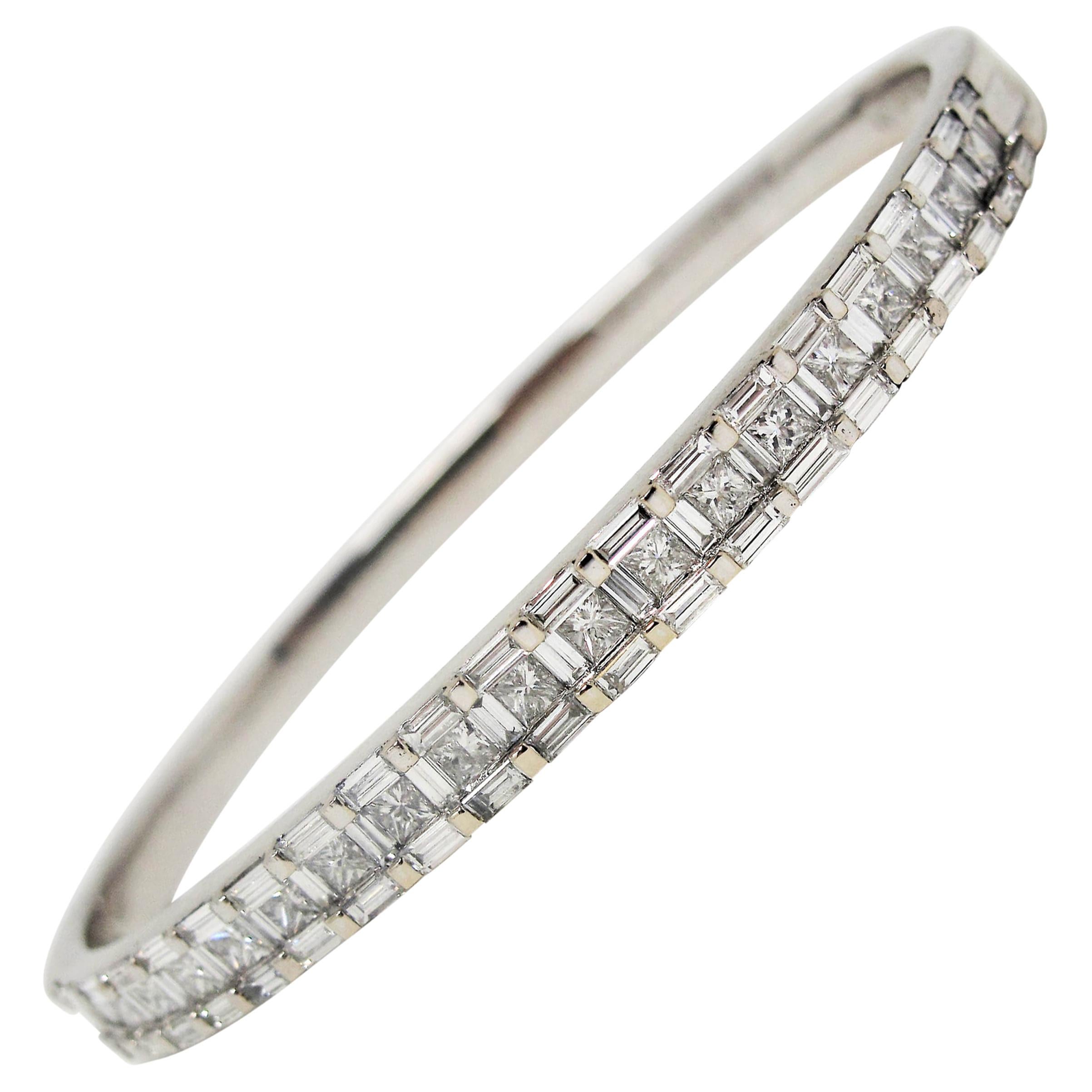 Baguette and Princess Cut Diamond Hinged Oval Bangle Bracelet in 18 Karat Gold