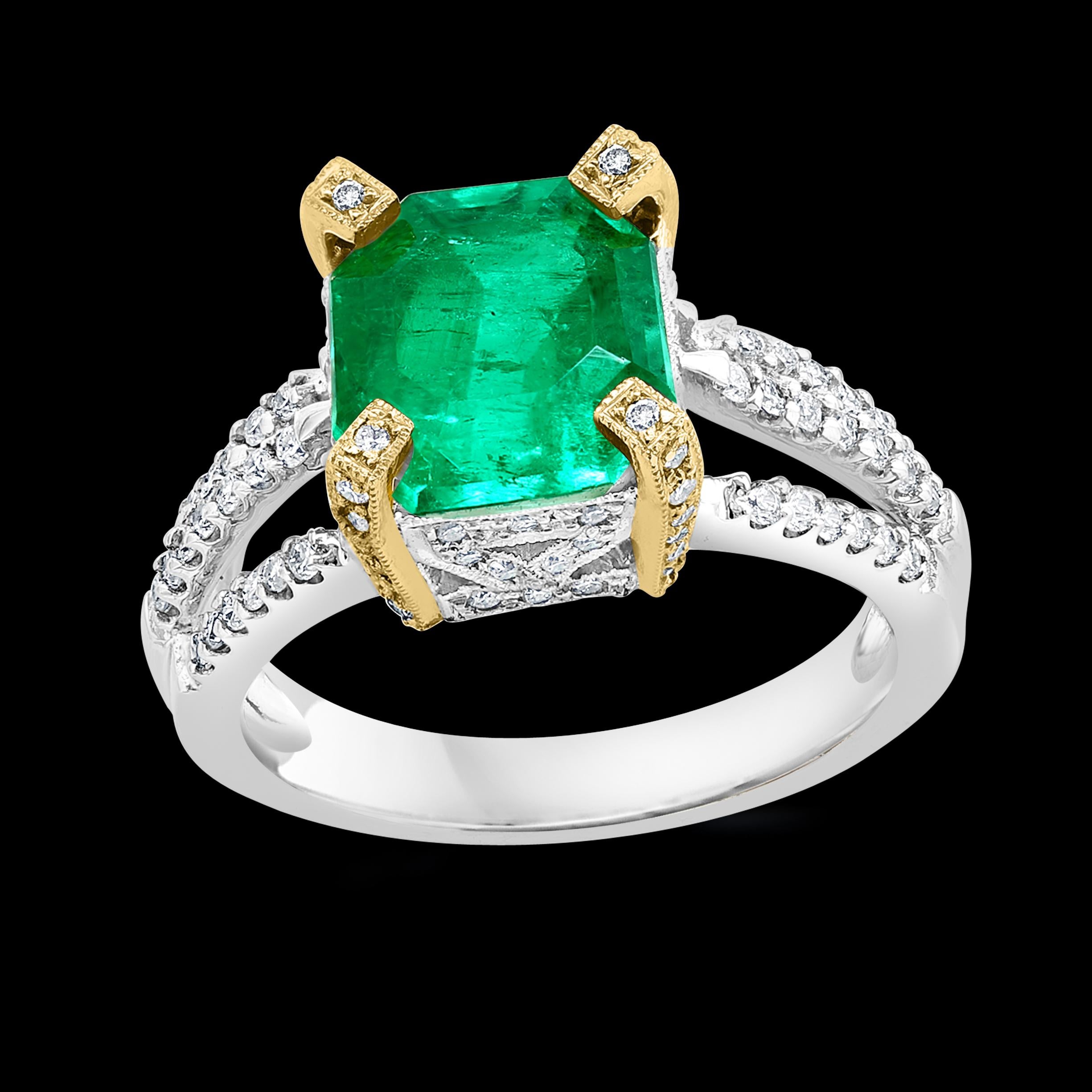 Extra Fine Colombian Emerald Ring
2.93 Carat Emerald  Cut Colombian Emerald & 0.52Ct Diamond Ring 18Karat White/Yellow Gold, Size 6.5
Extreme Fine quality of the Colombian Emerald
2,93 Carat exact weight   Colombian Emerald Absolutely gorgeous