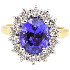 2.93 Carat Oval Cut Tanzanite Diamond Handmade 18 Carat Gold Cocktail Ring